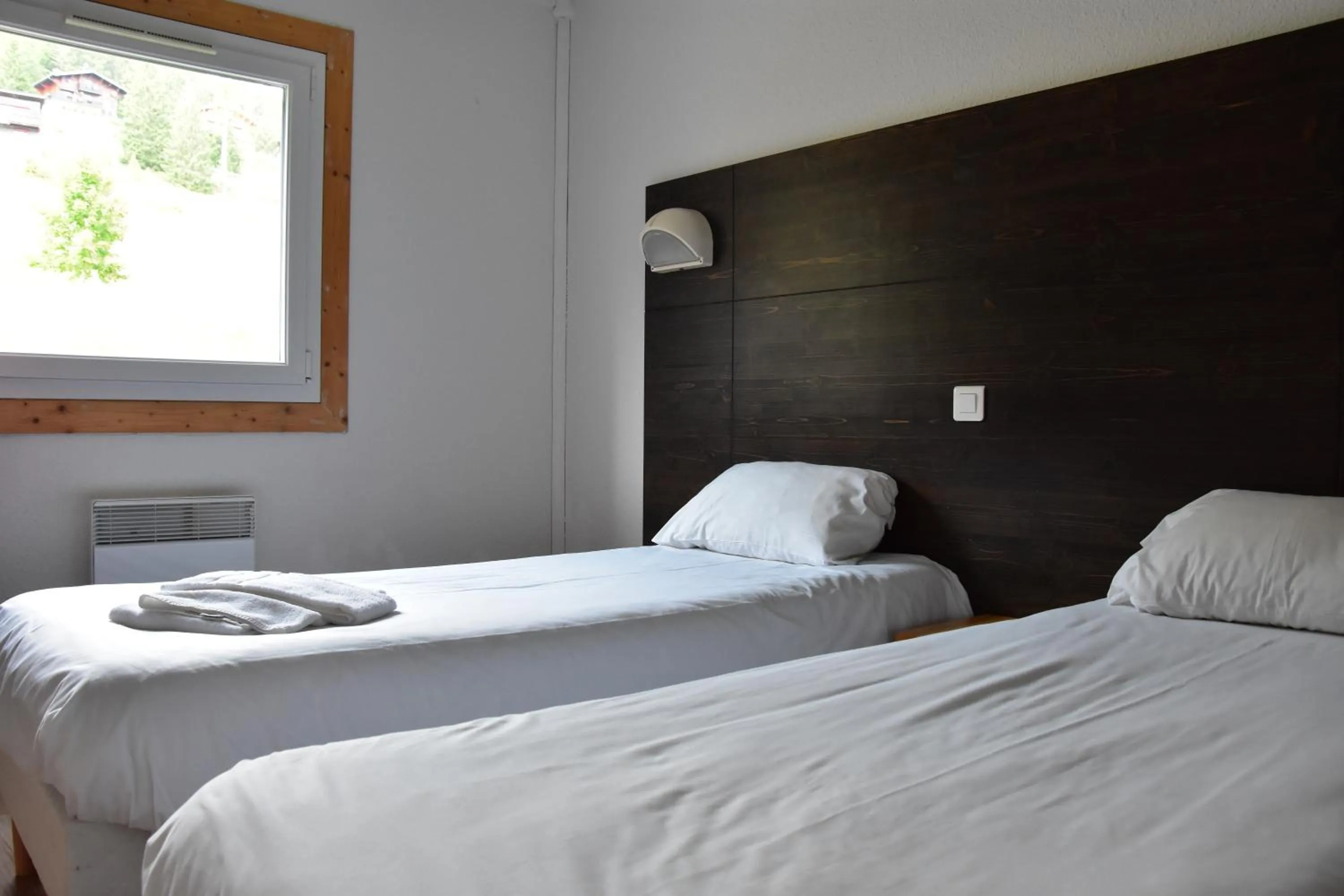 Bedroom, Bed in Village club de Bois d'Amont