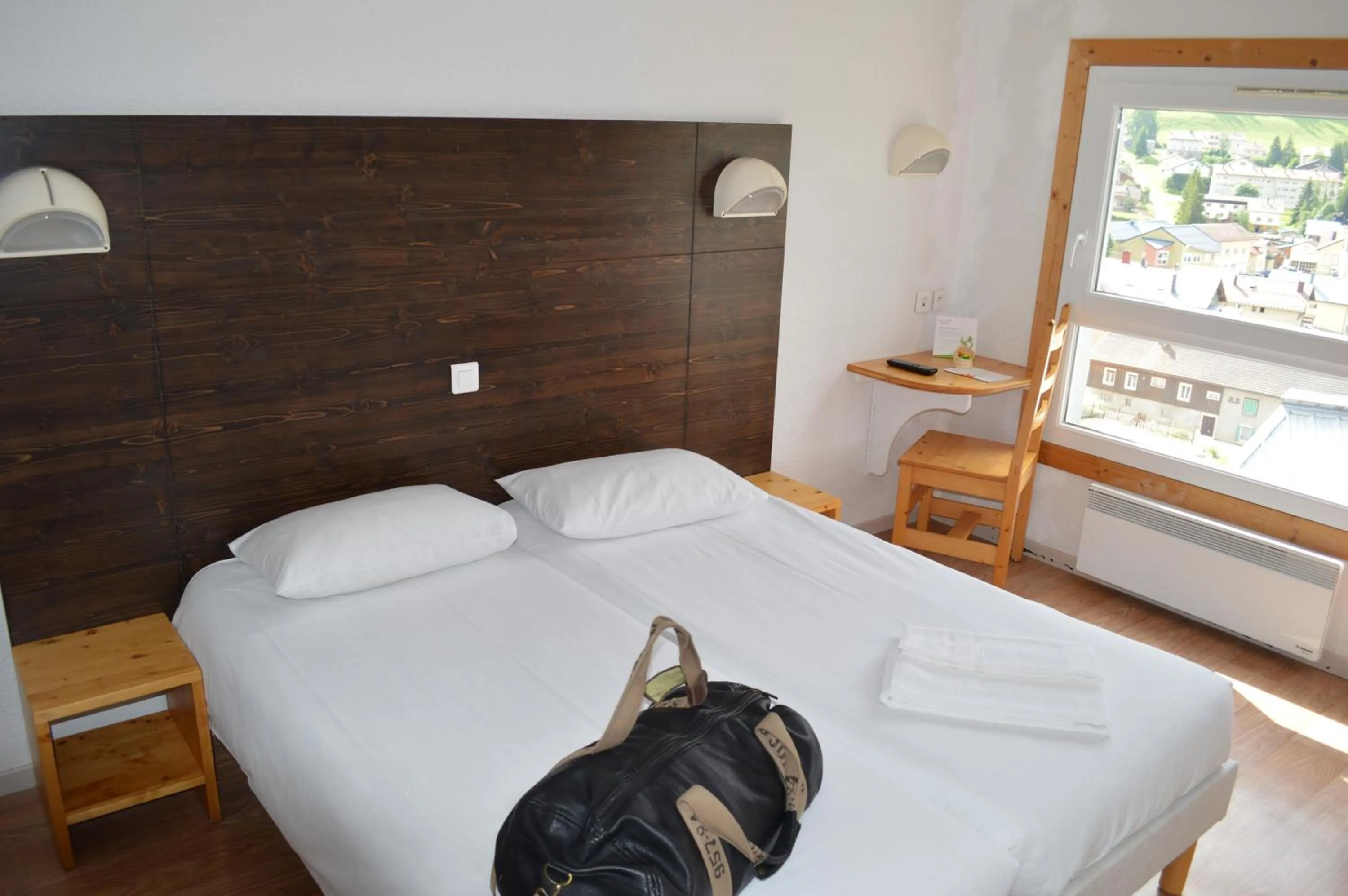 Photo of the whole room, Bed in Village club de Bois d'Amont