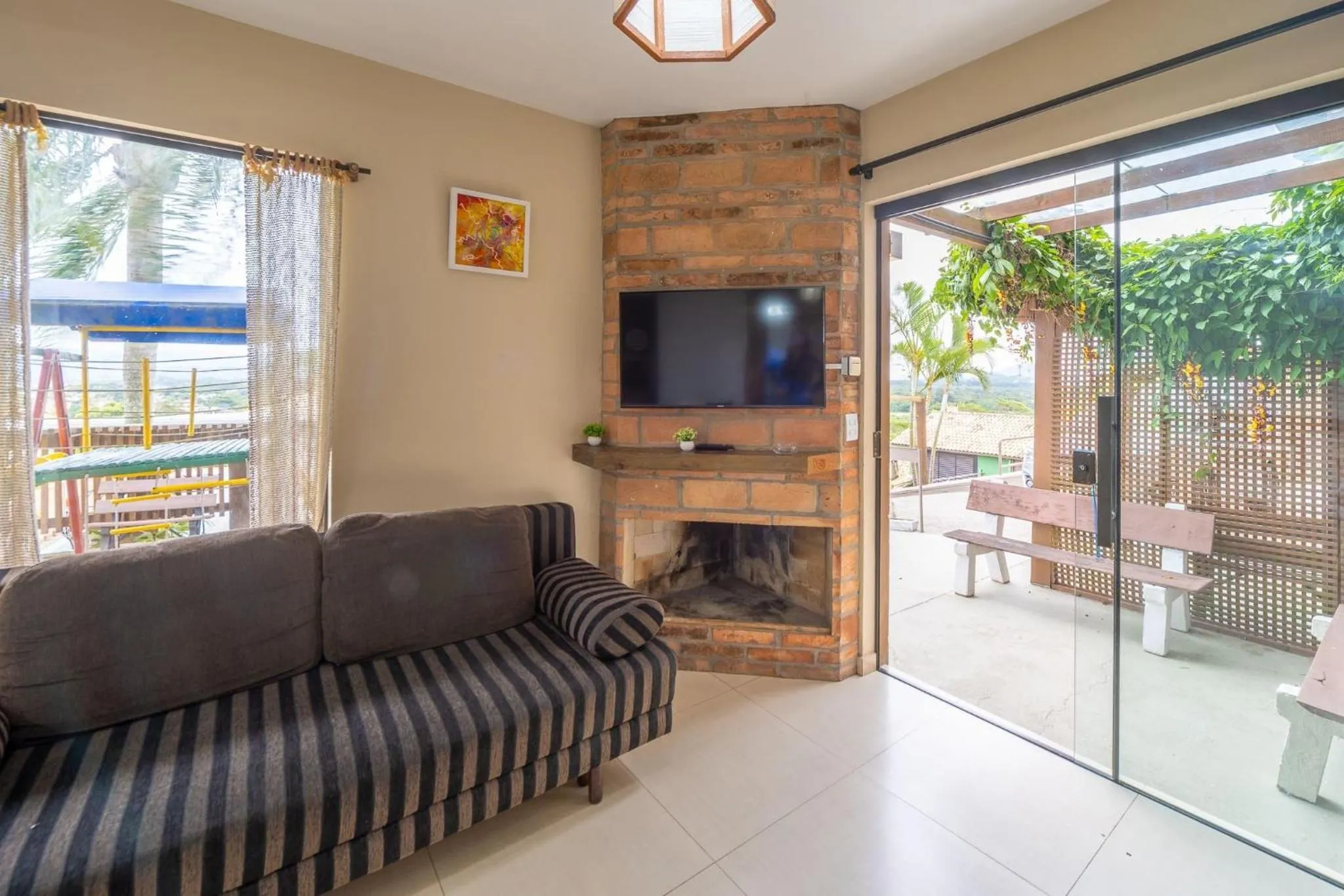 TV and multimedia in Pousada Bangalôs do Rosa