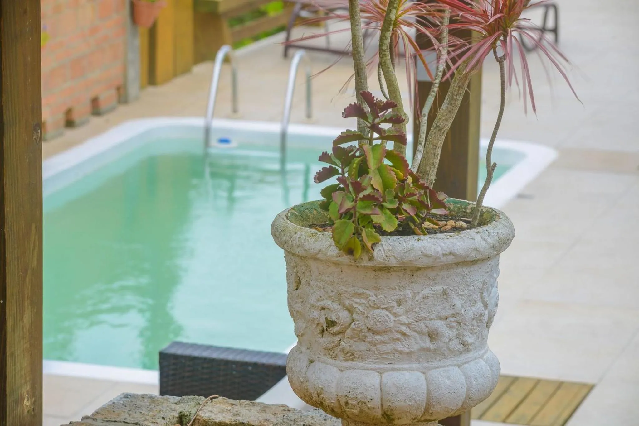 Swimming pool in Pousada Bangalôs do Rosa