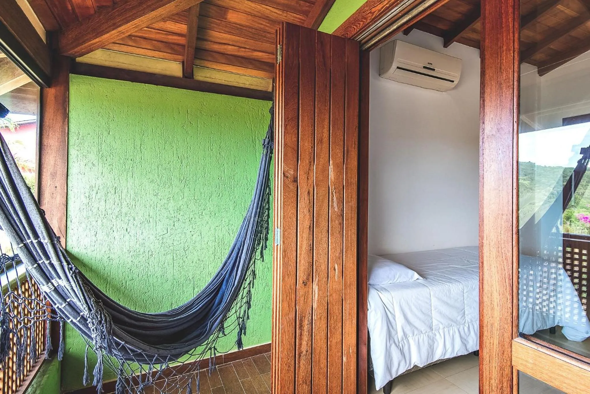 Balcony/Terrace, Bed in Pousada Bangalôs do Rosa