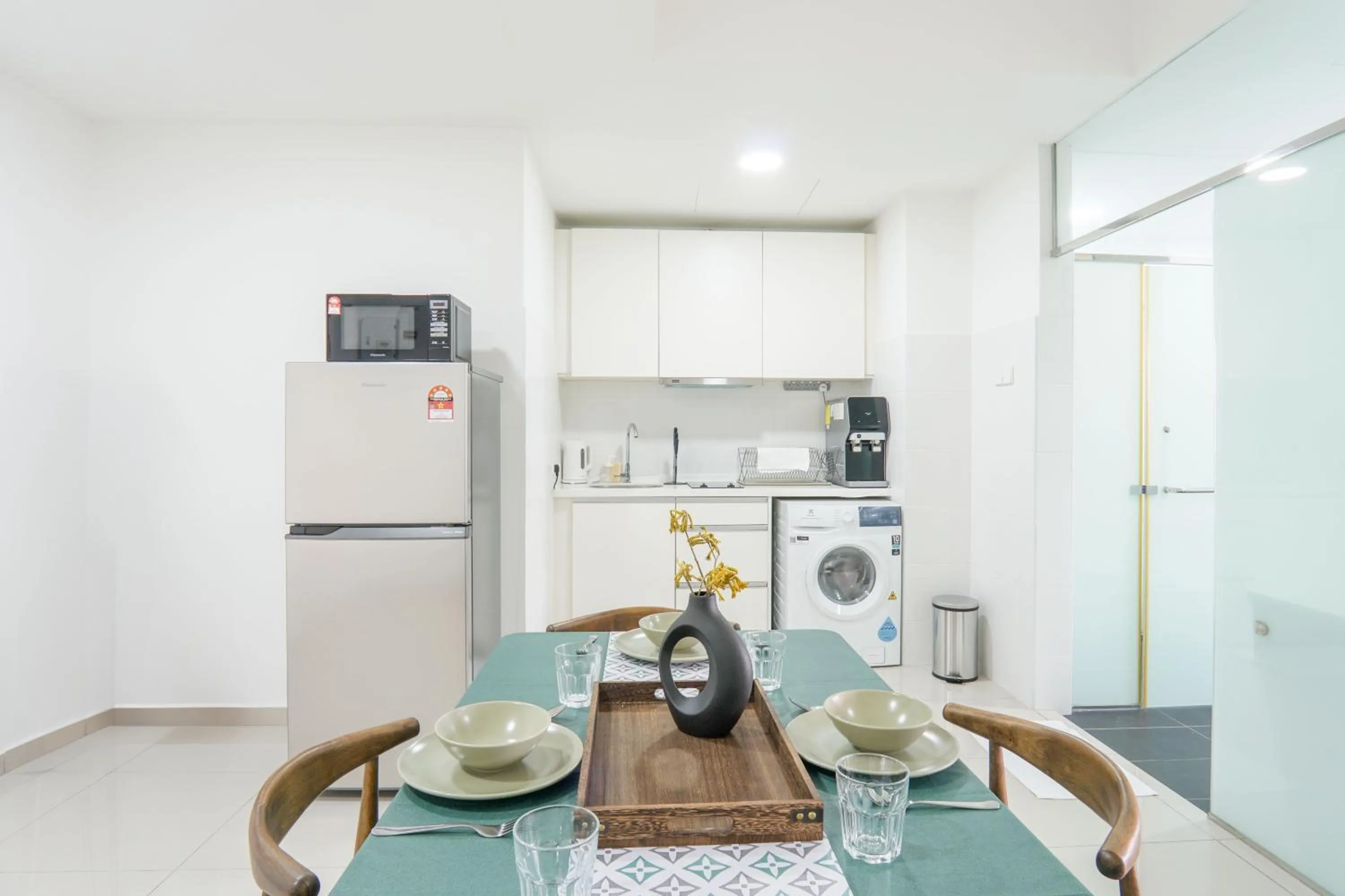 Kitchen or kitchenette in Encorp Strand Residences by Airhost