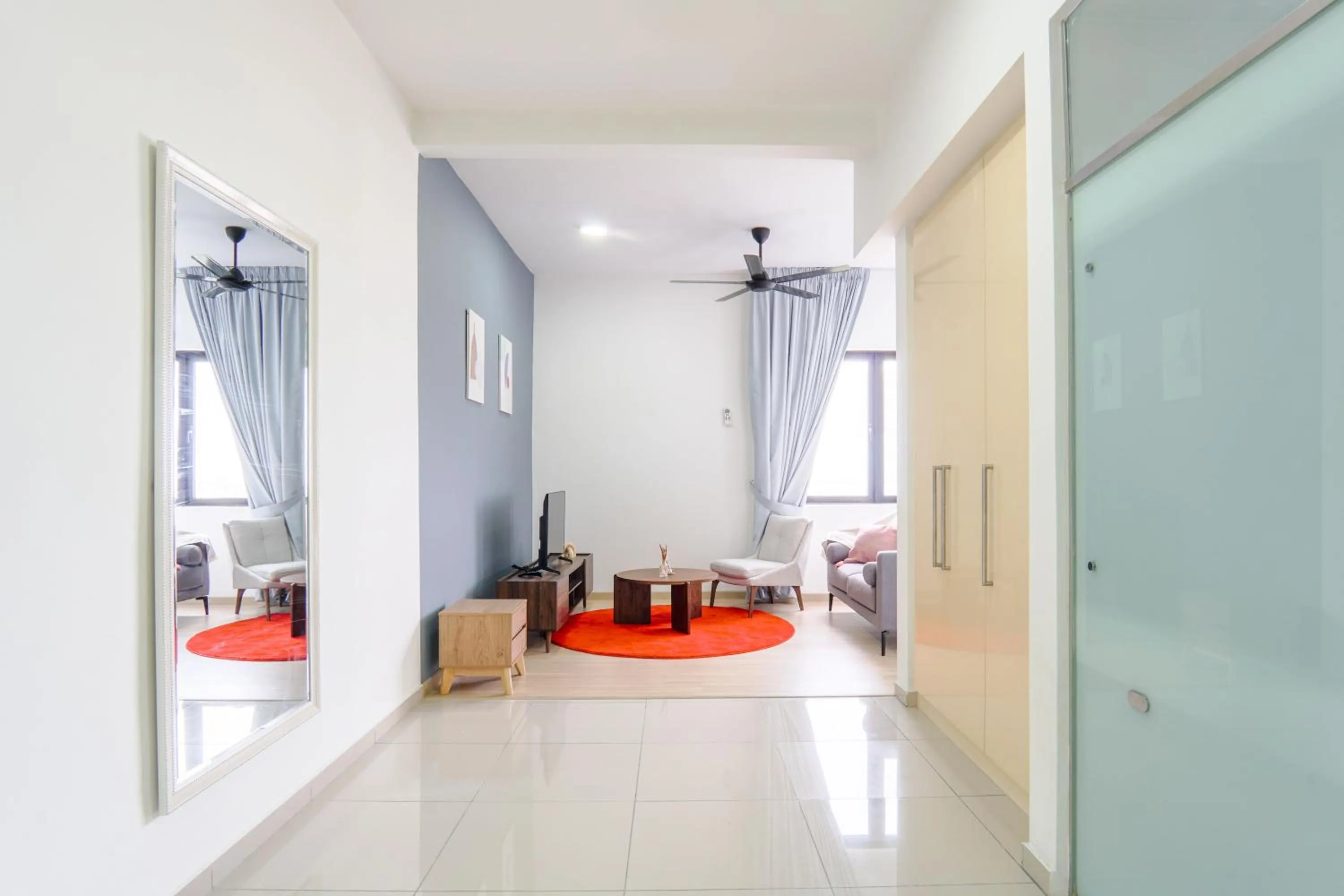 Living room, Bed in Encorp Strand Residences by Airhost