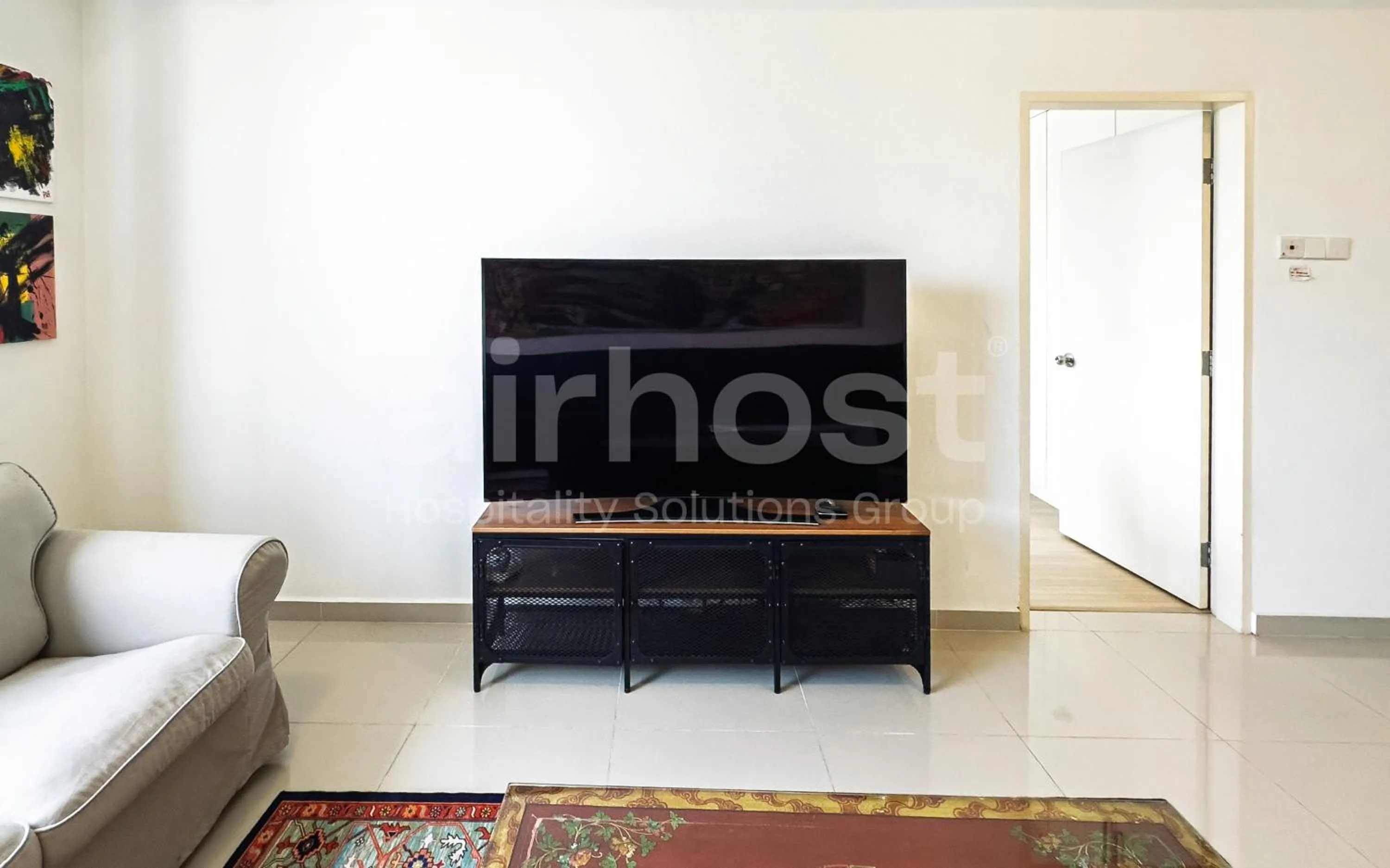 Living room in Encorp Strand Residences by Airhost