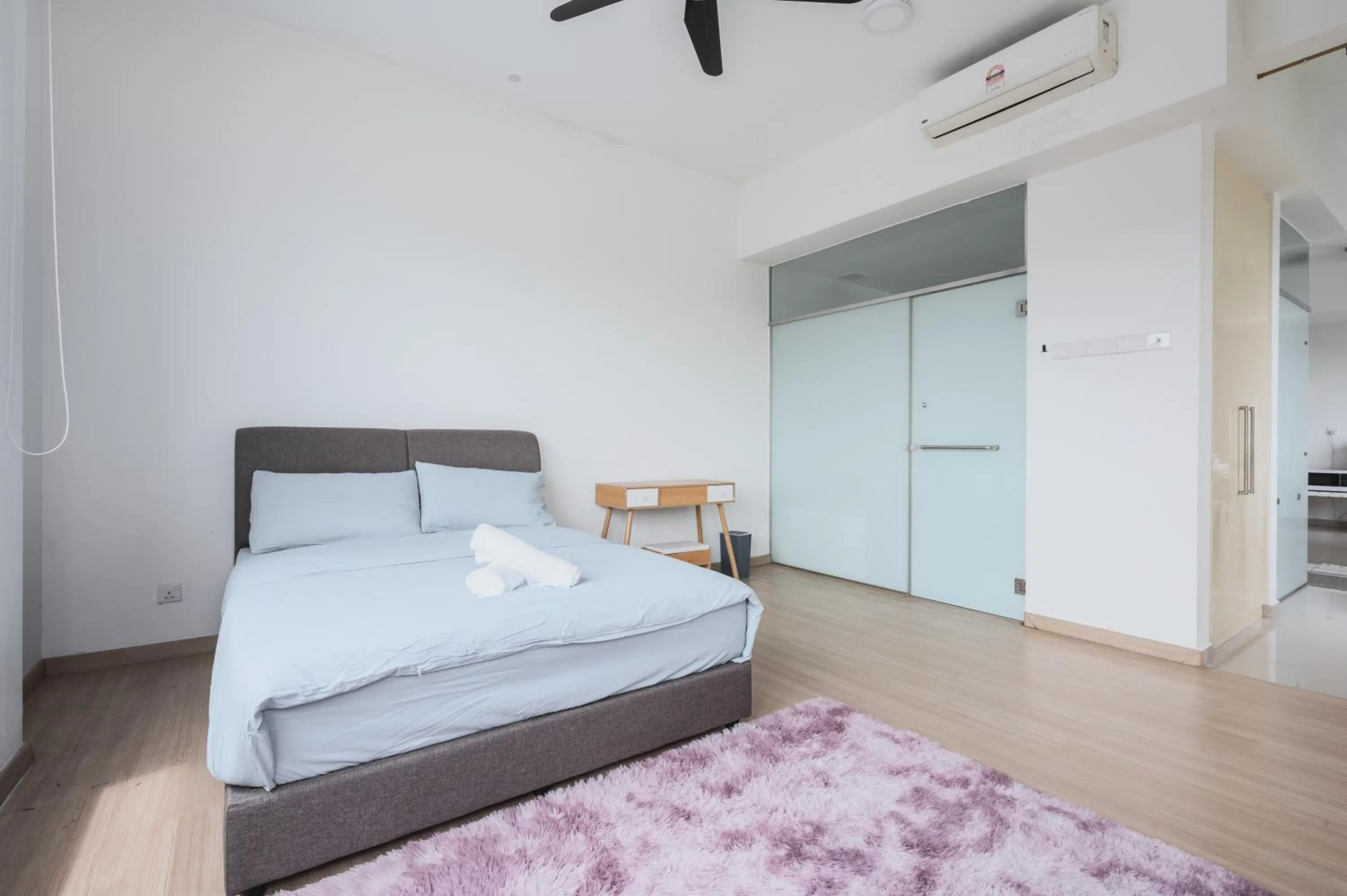 Bedroom, Bed in Encorp Strand Residences by Airhost