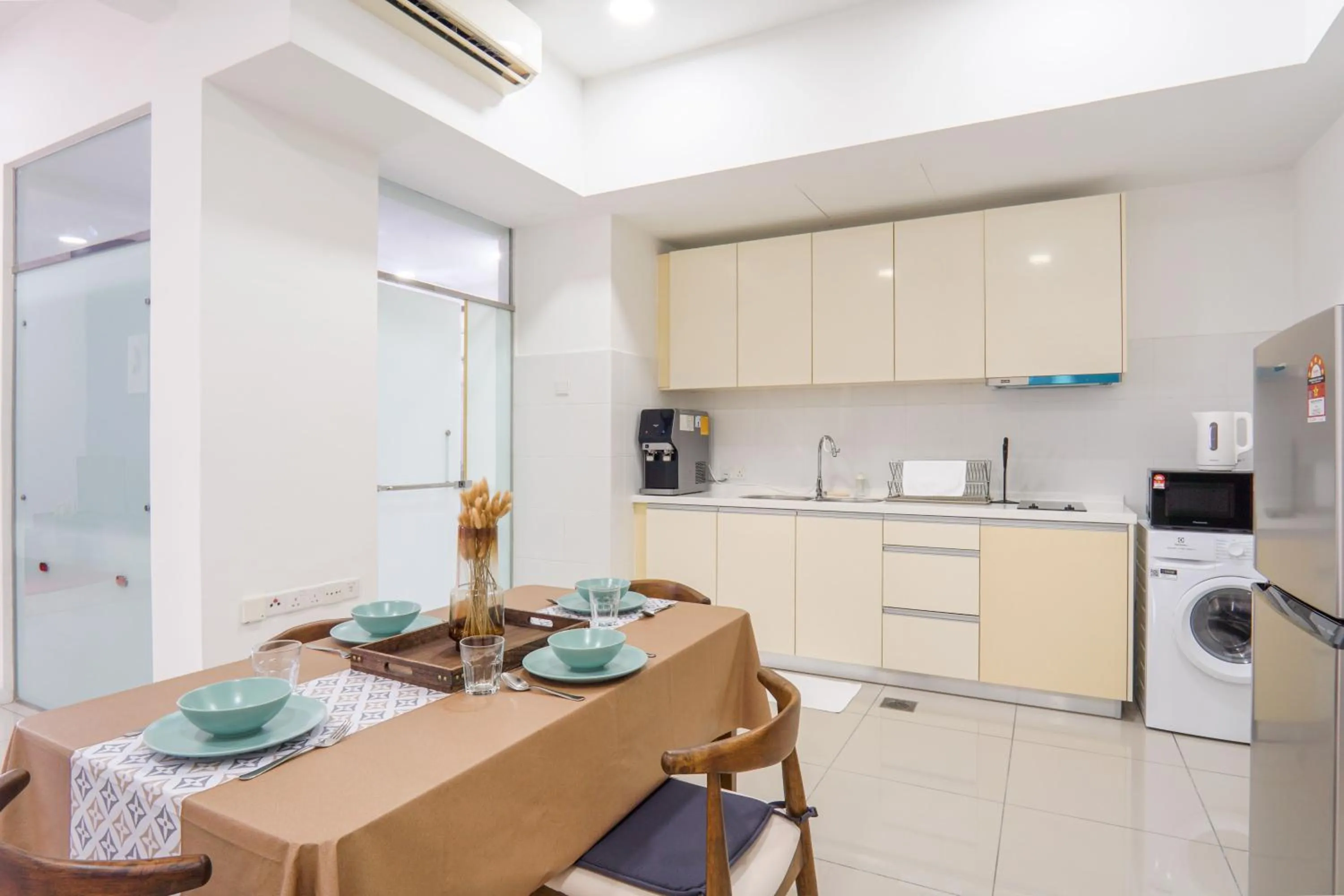 Kitchen or kitchenette in Encorp Strand Residences by Airhost