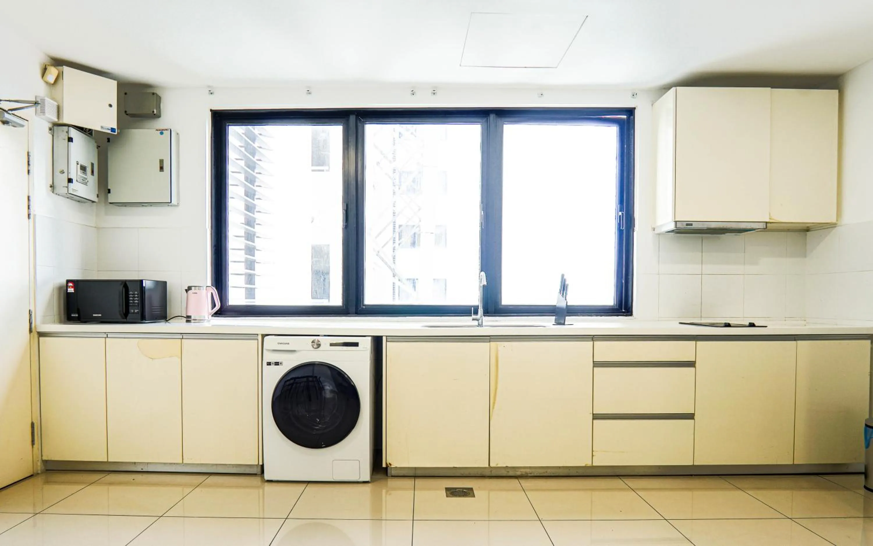 Kitchen or kitchenette in Encorp Strand Residences by Airhost