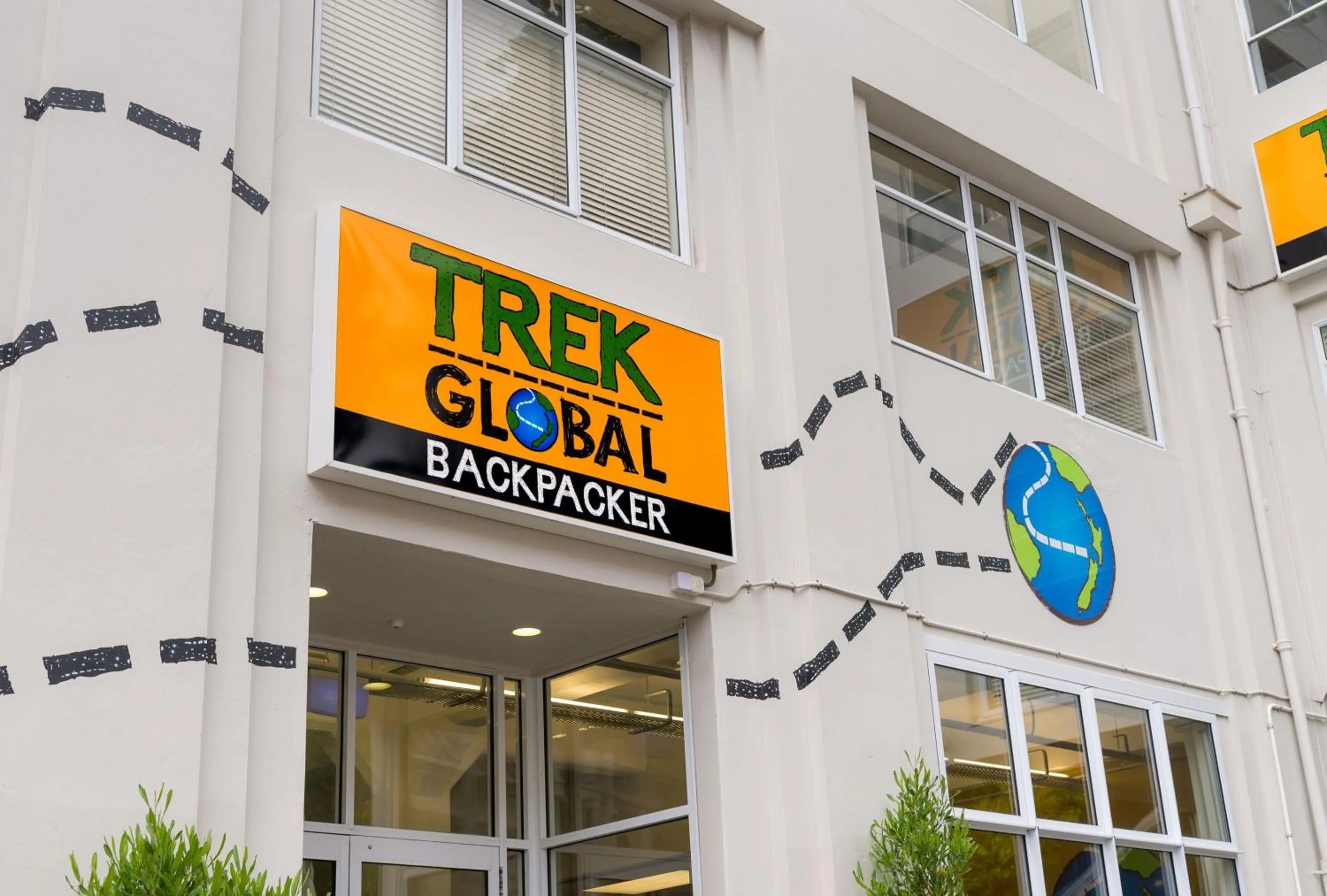 Property logo or sign in Trek Global Backpackers