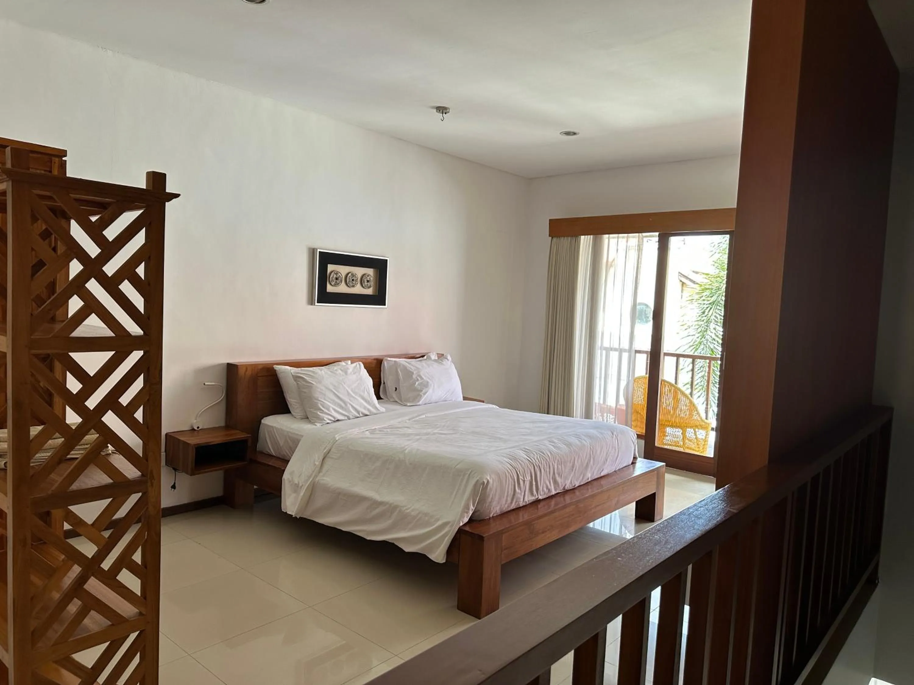 Bed in Balcony Living Apartment