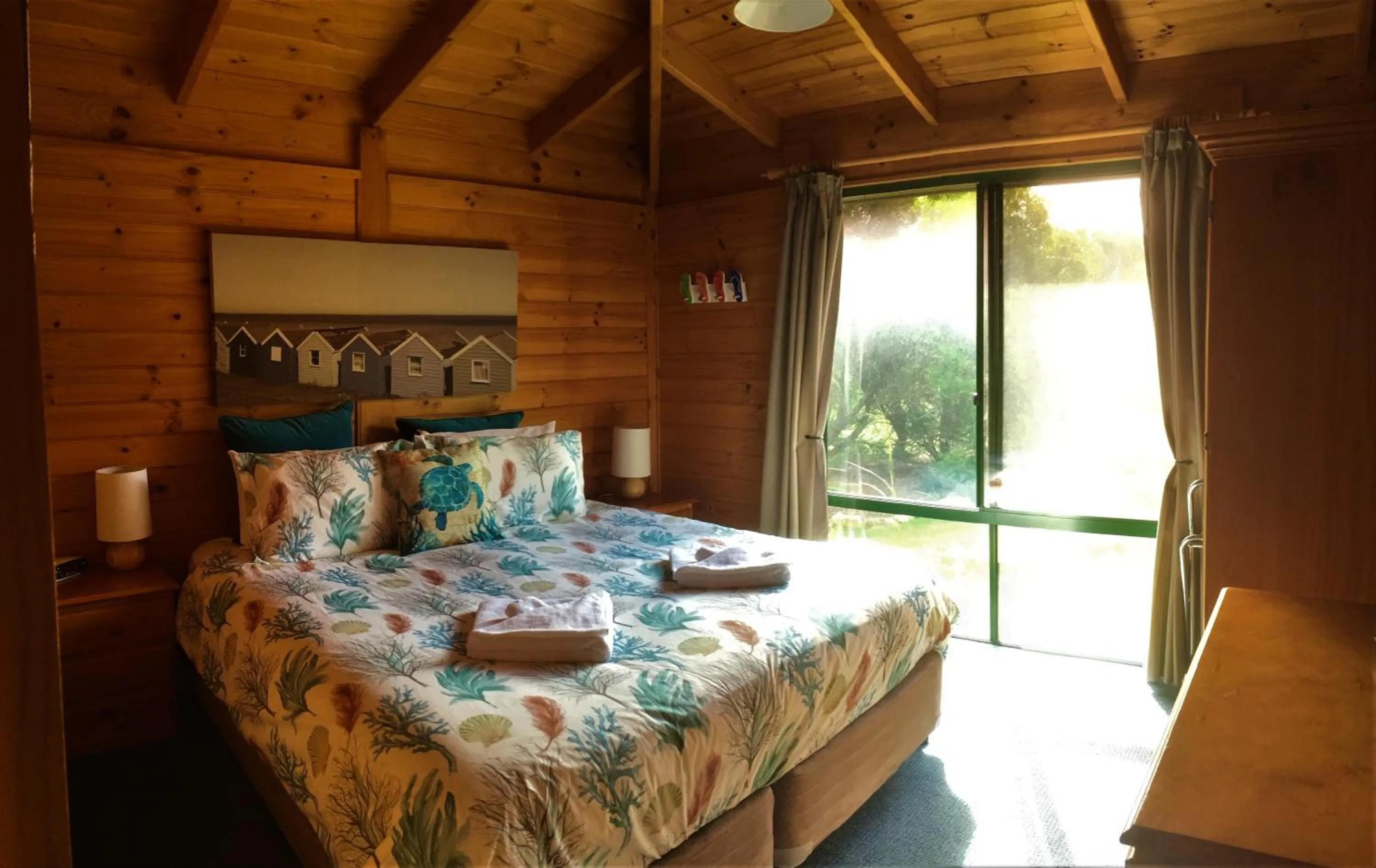 Bed in Sandpiper Ocean Cottages