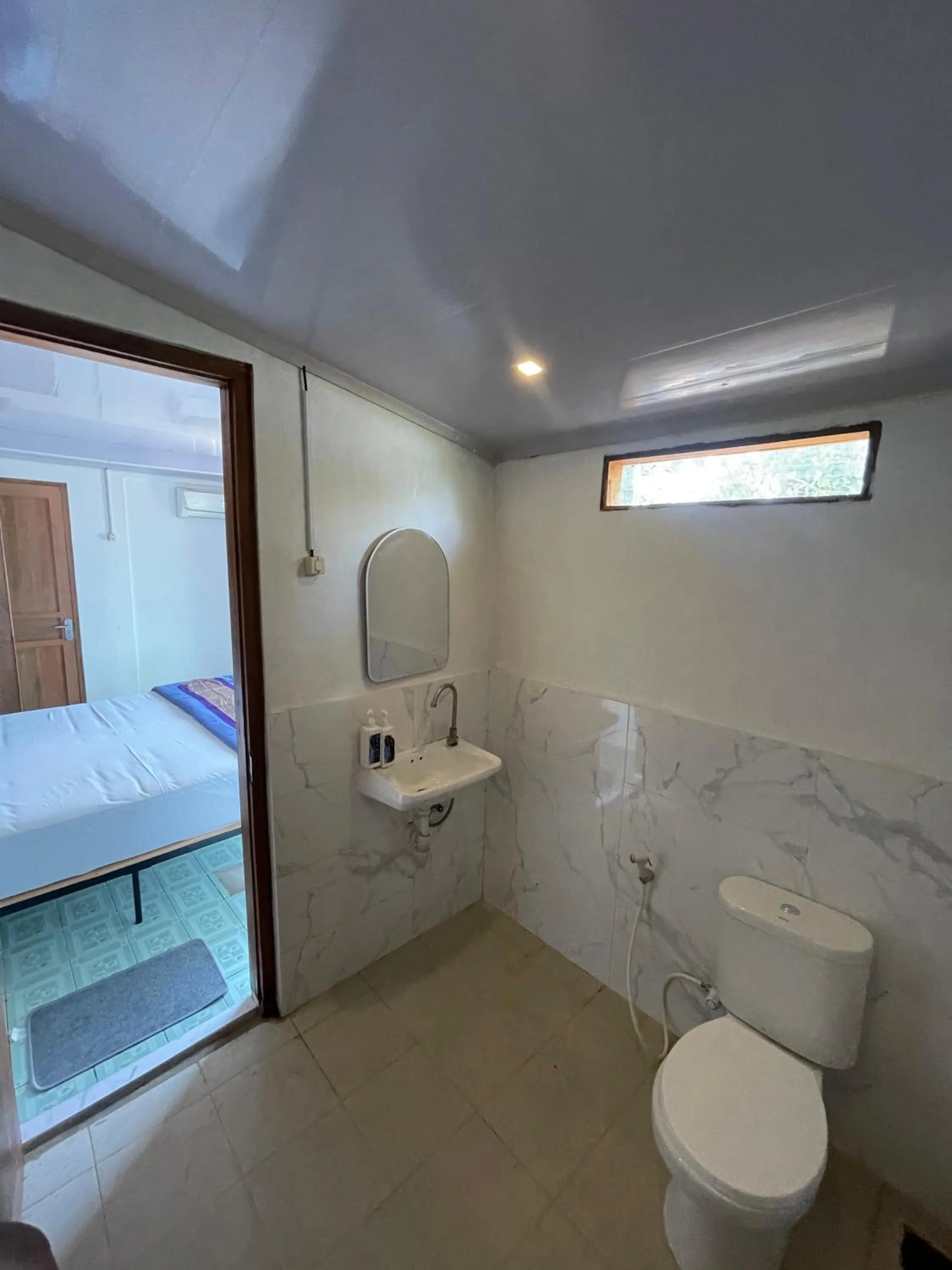 Bed in Omah Alchy Cottages