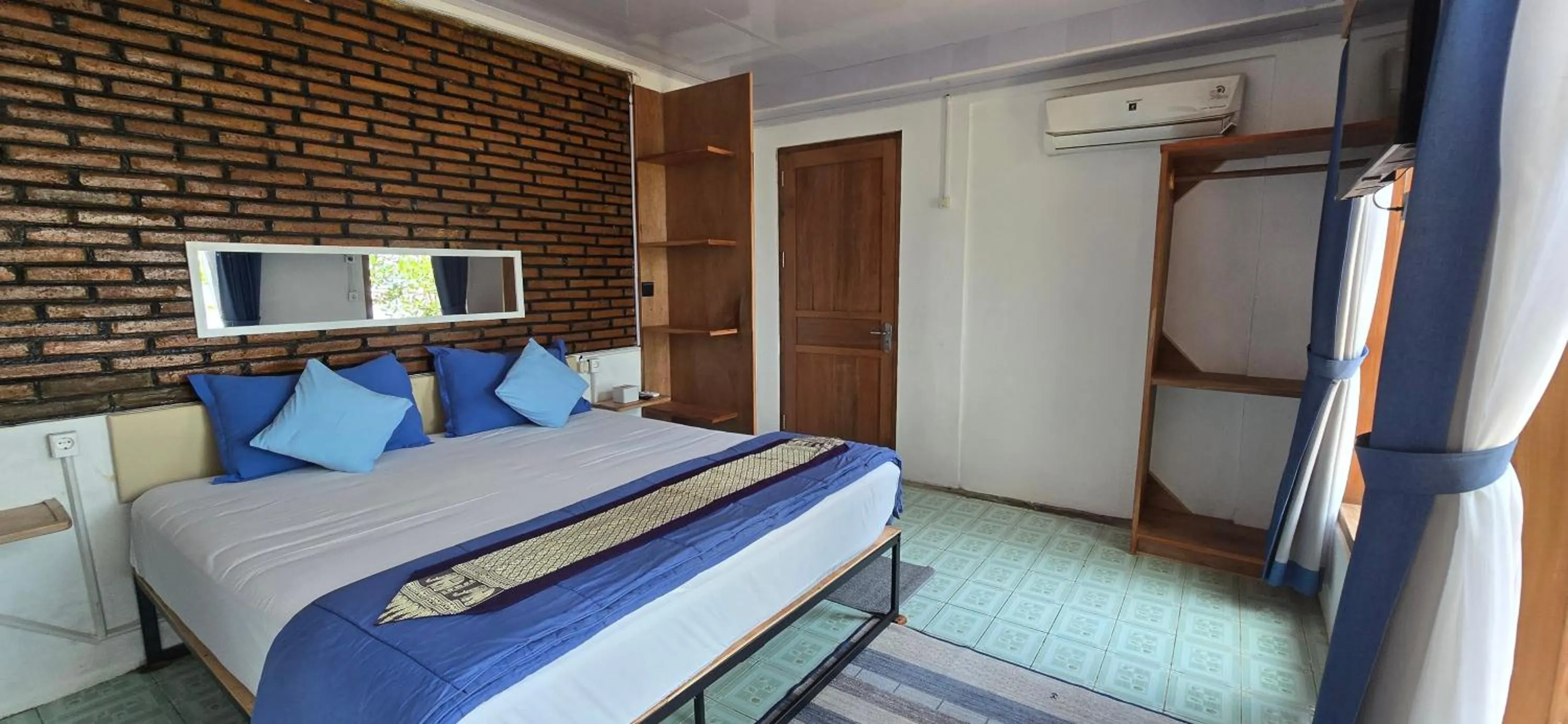 Bed in Omah Alchy Cottages