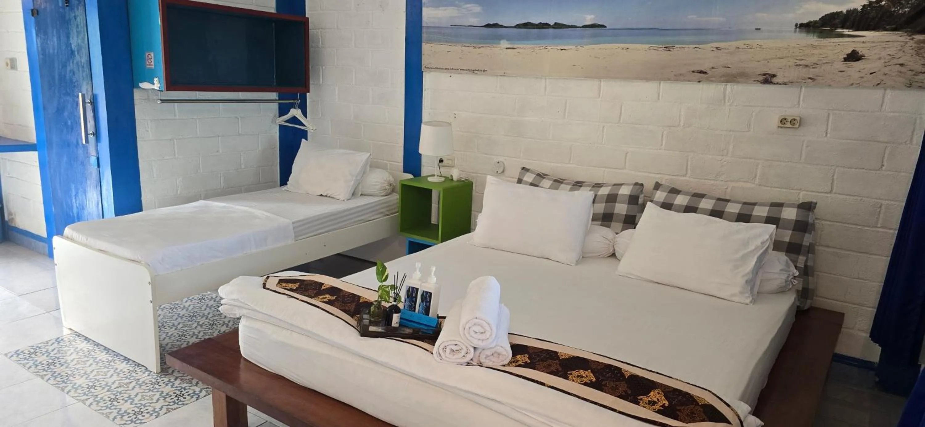 Bed in Omah Alchy Cottages