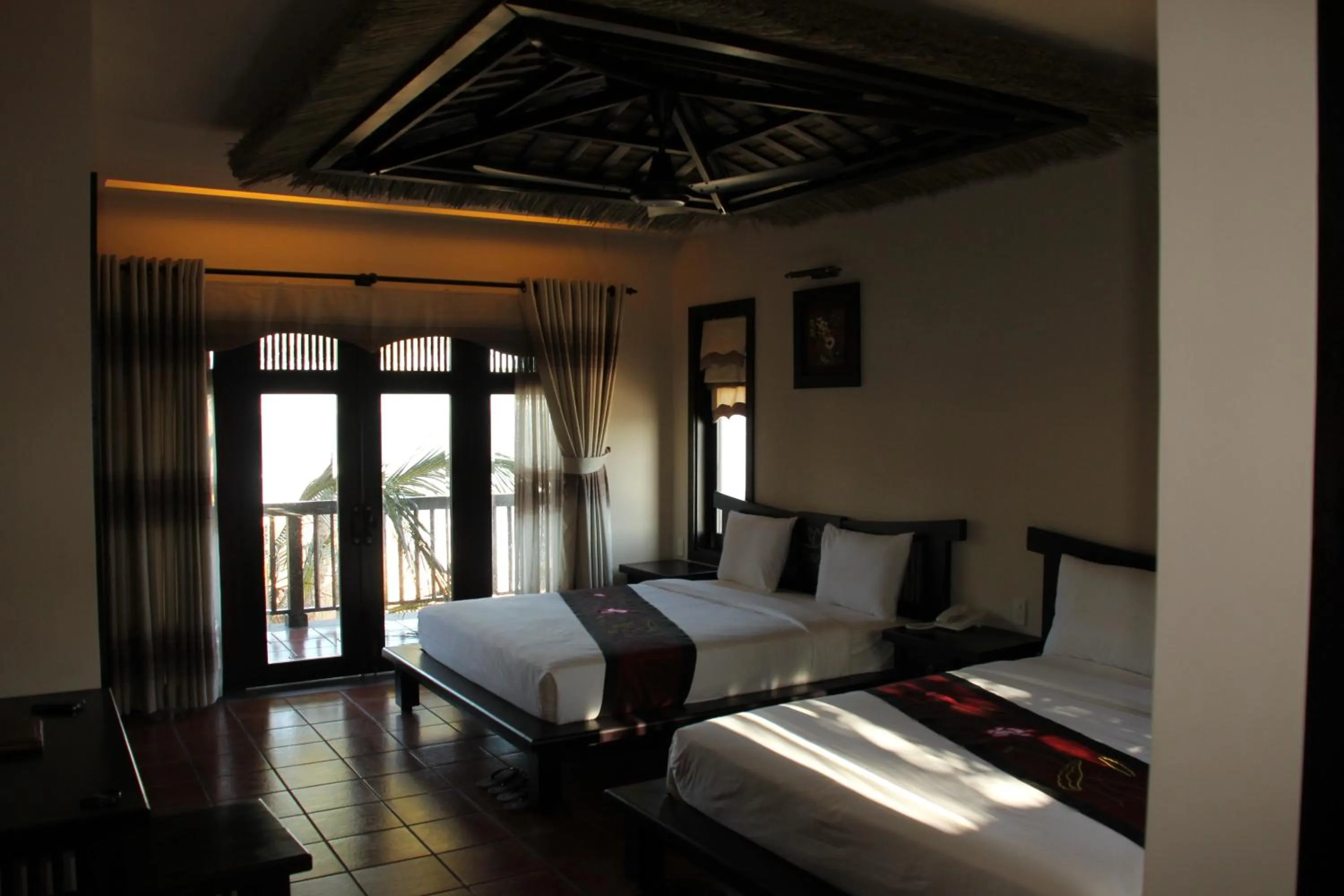 Bedroom, Bed in Lotus Village Resort