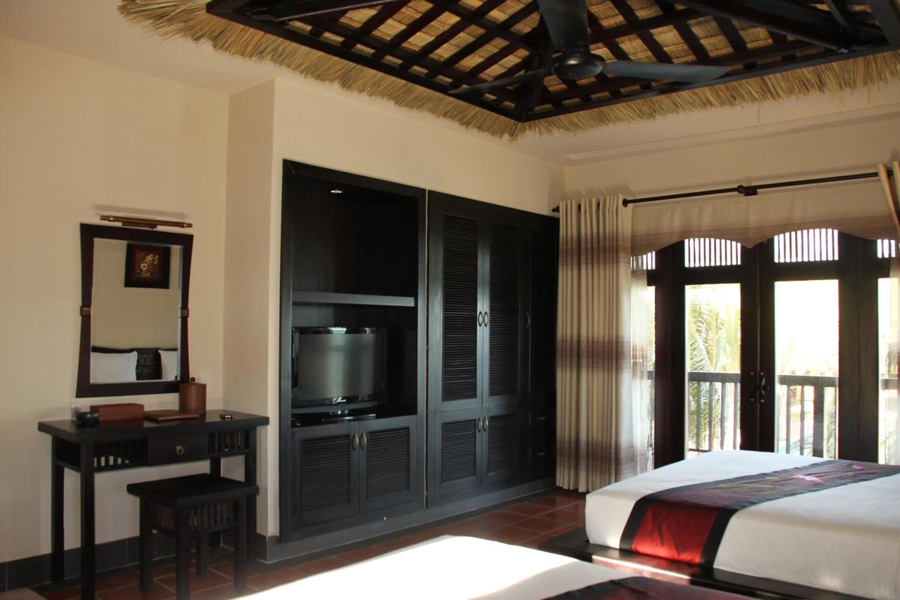 Bedroom, Bed in Lotus Village Resort