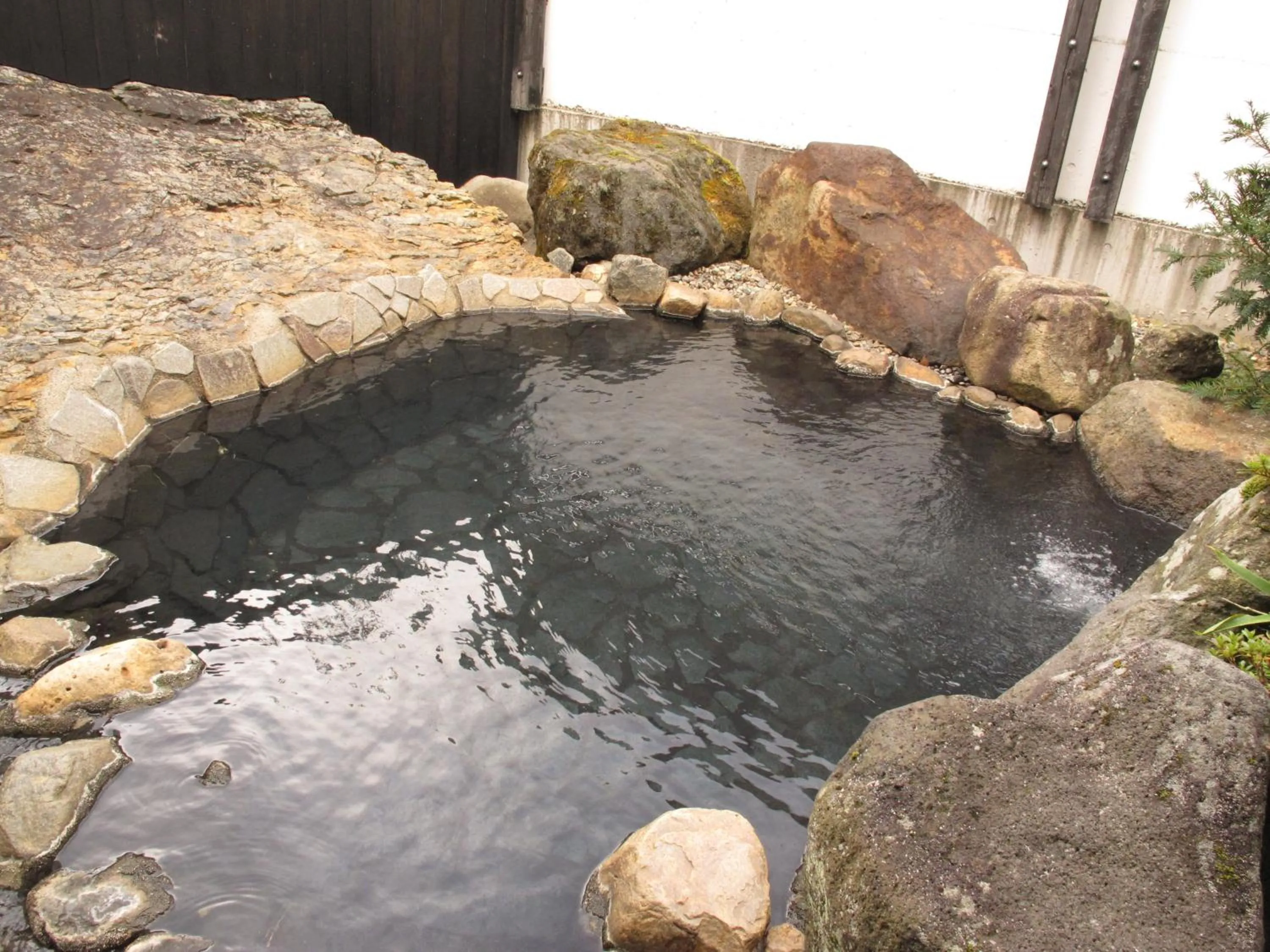 Hot Spring Bath in Okada Ryokan Warakutei