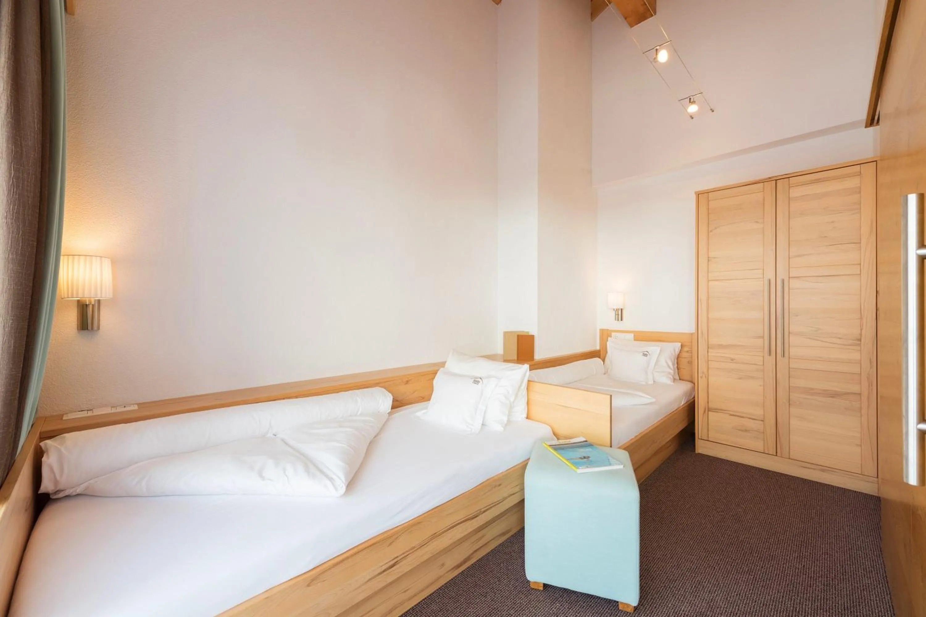 Photo of the whole room, Bed in Alpinhotel Monte Superior - Silvretta Card Premium Betrieb