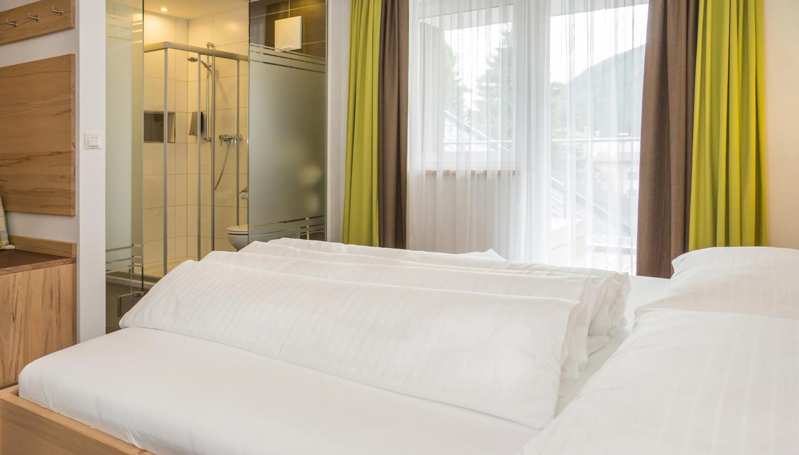 Bed in Alpinhotel Monte Superior - Silvretta Card Premium Betrieb