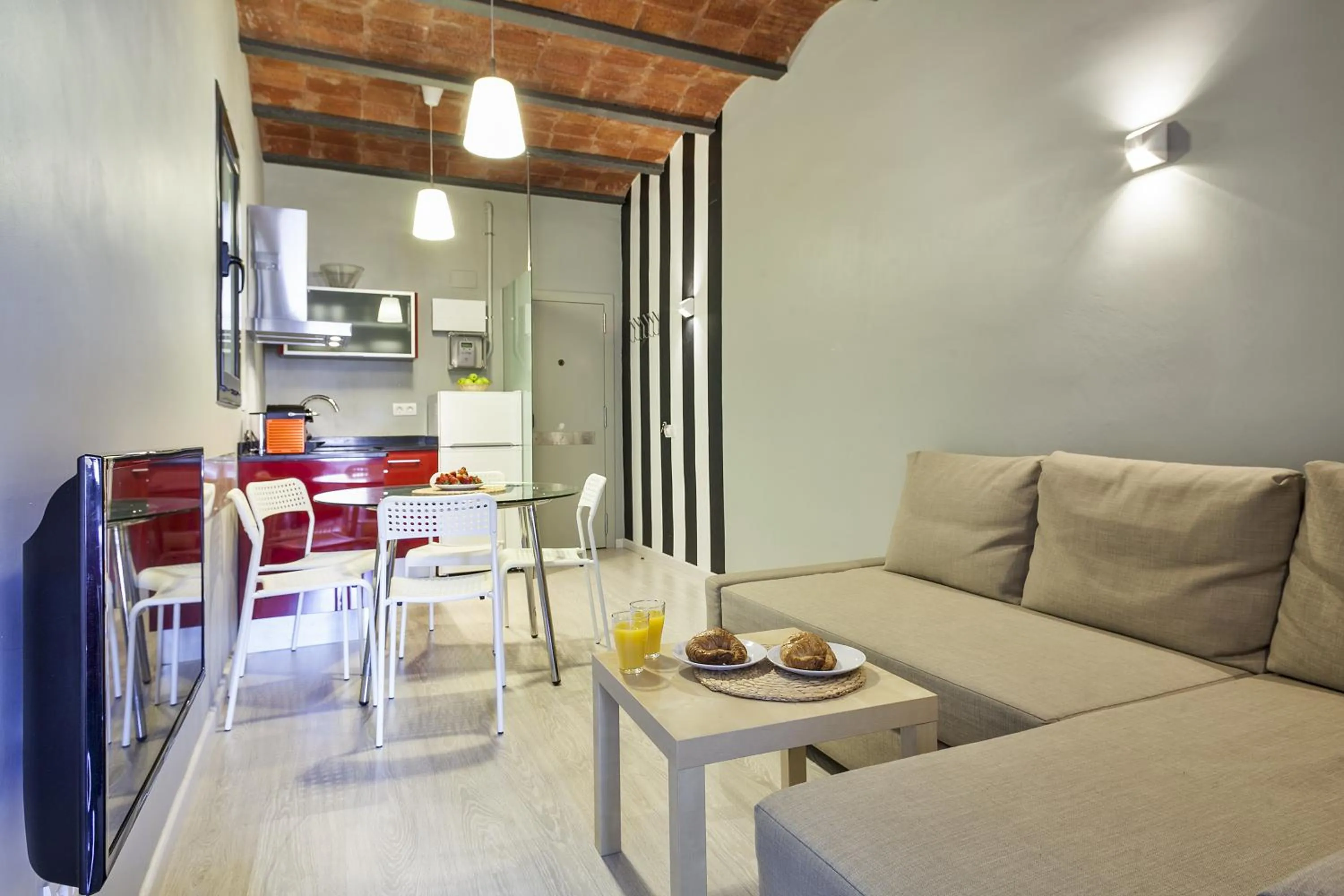 Kitchen or kitchenette in Fira Apartments by gaiarooms