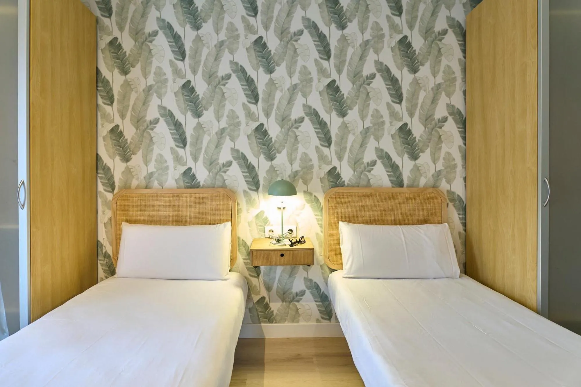 Bed in Fira Apartments by gaiarooms