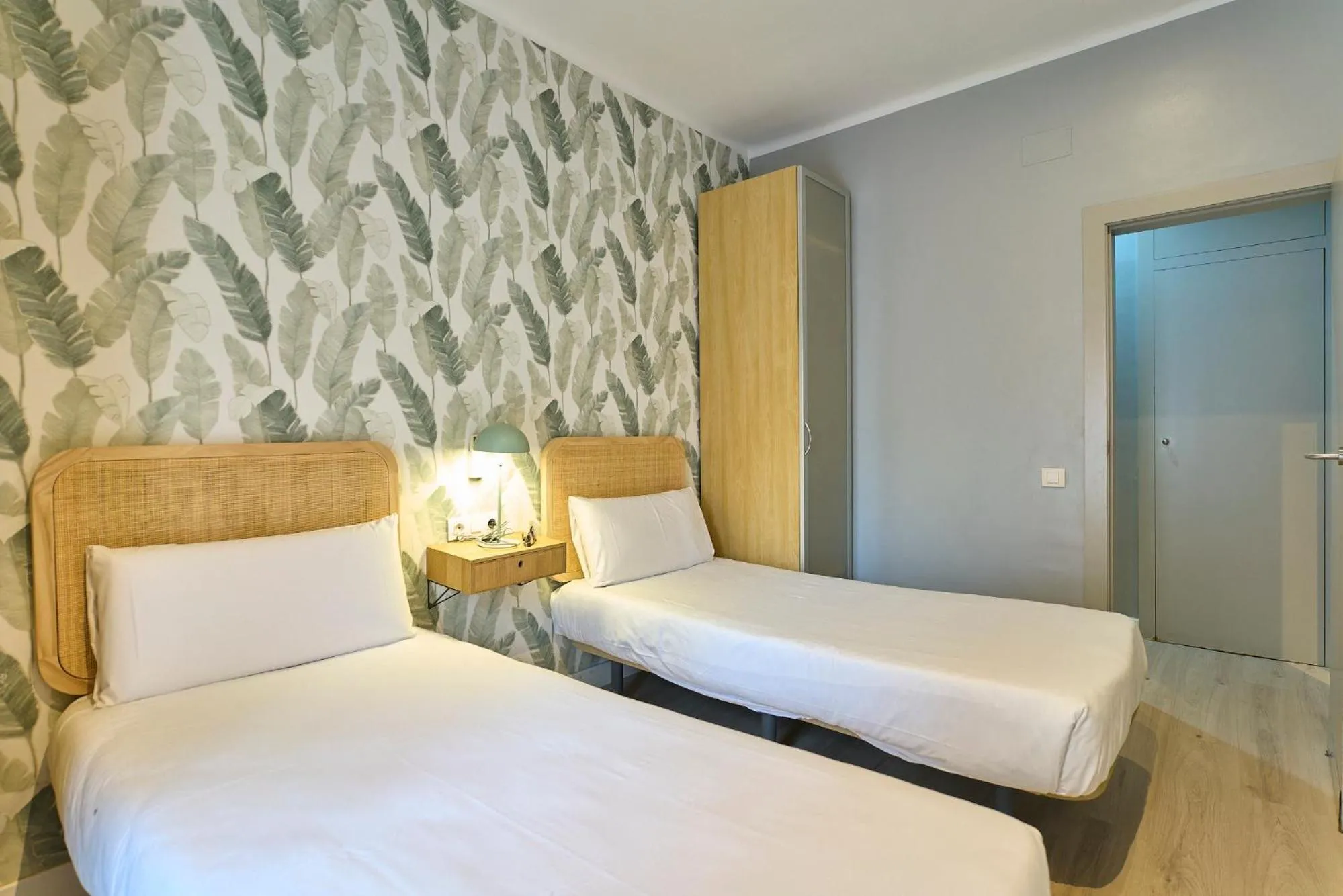 Bed in Fira Apartments by gaiarooms