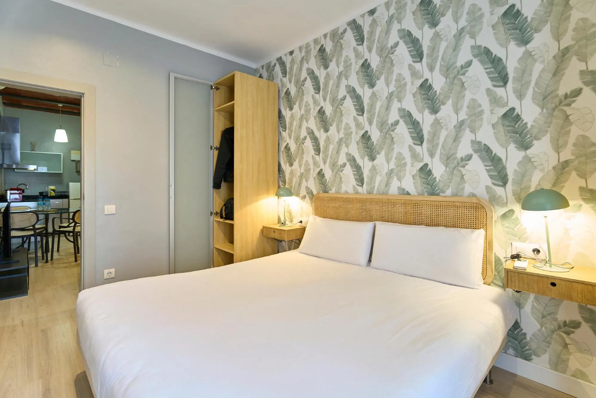 Bed in Fira Apartments by gaiarooms