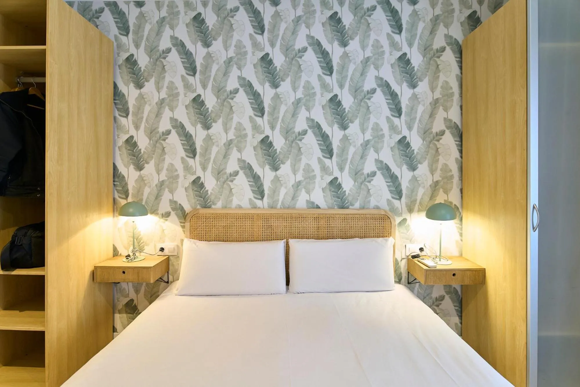 Bed in Fira Apartments by gaiarooms