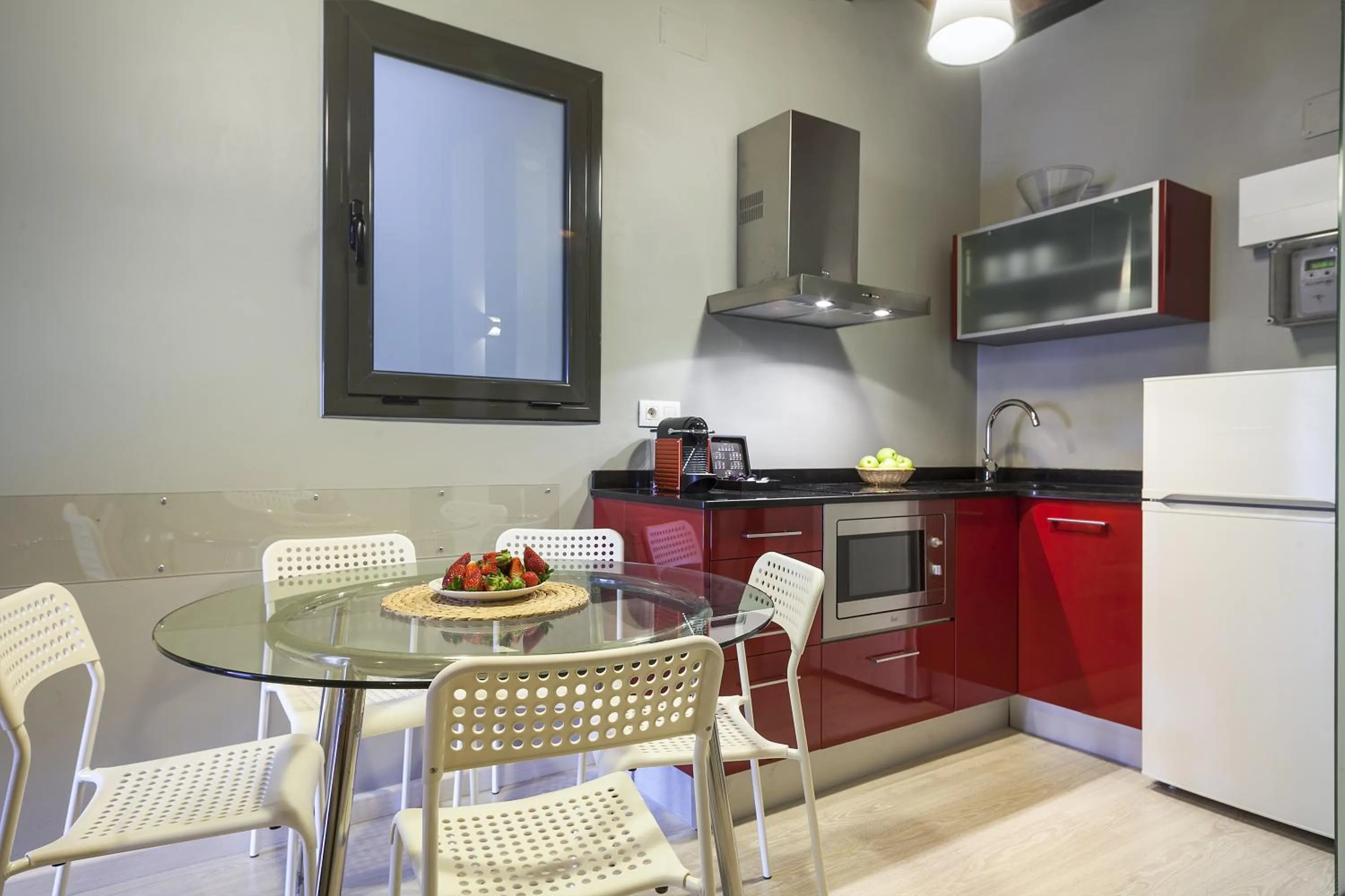 Kitchen or kitchenette in Fira Apartments by gaiarooms
