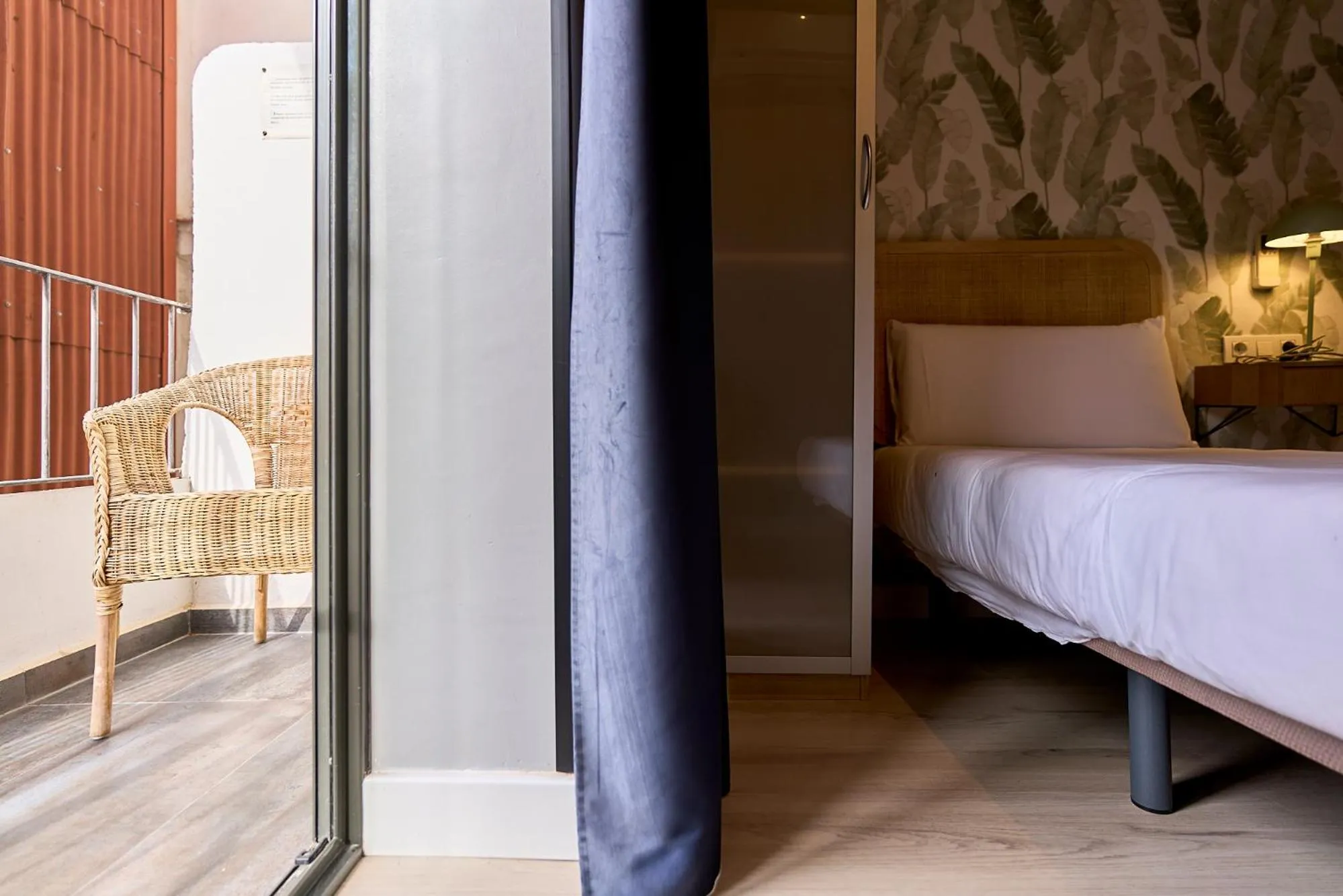 Bed in Fira Apartments by gaiarooms