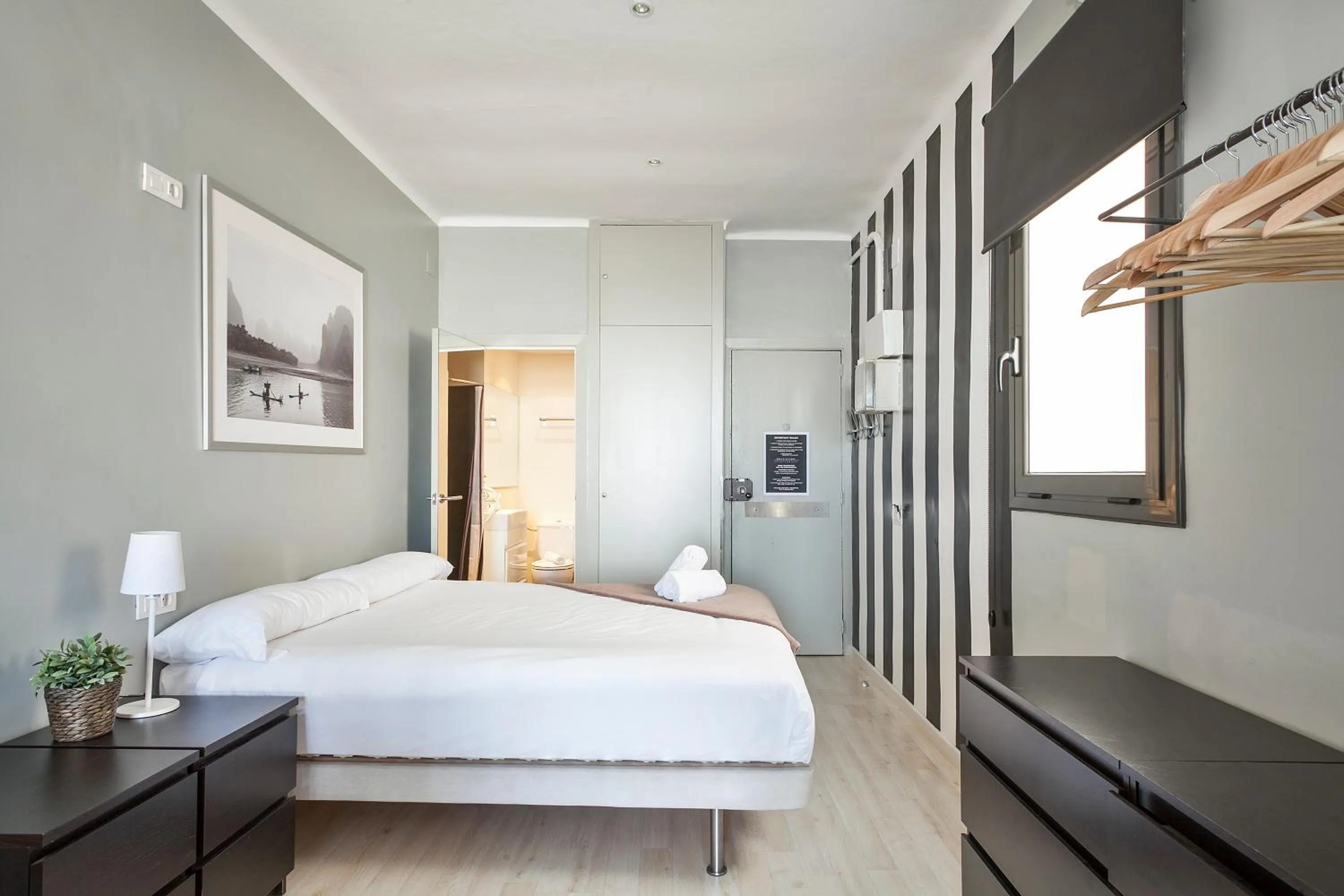 Bedroom, Bed in Fira Apartments by gaiarooms