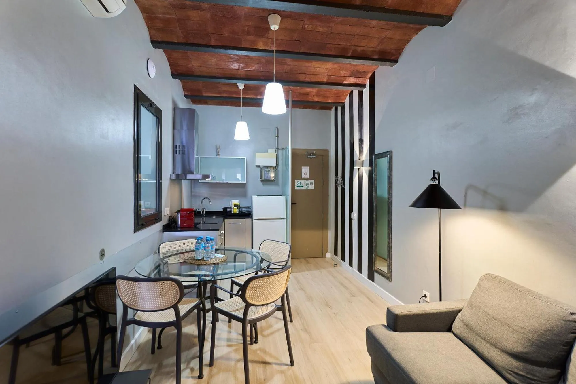 Living room in Fira Apartments by gaiarooms