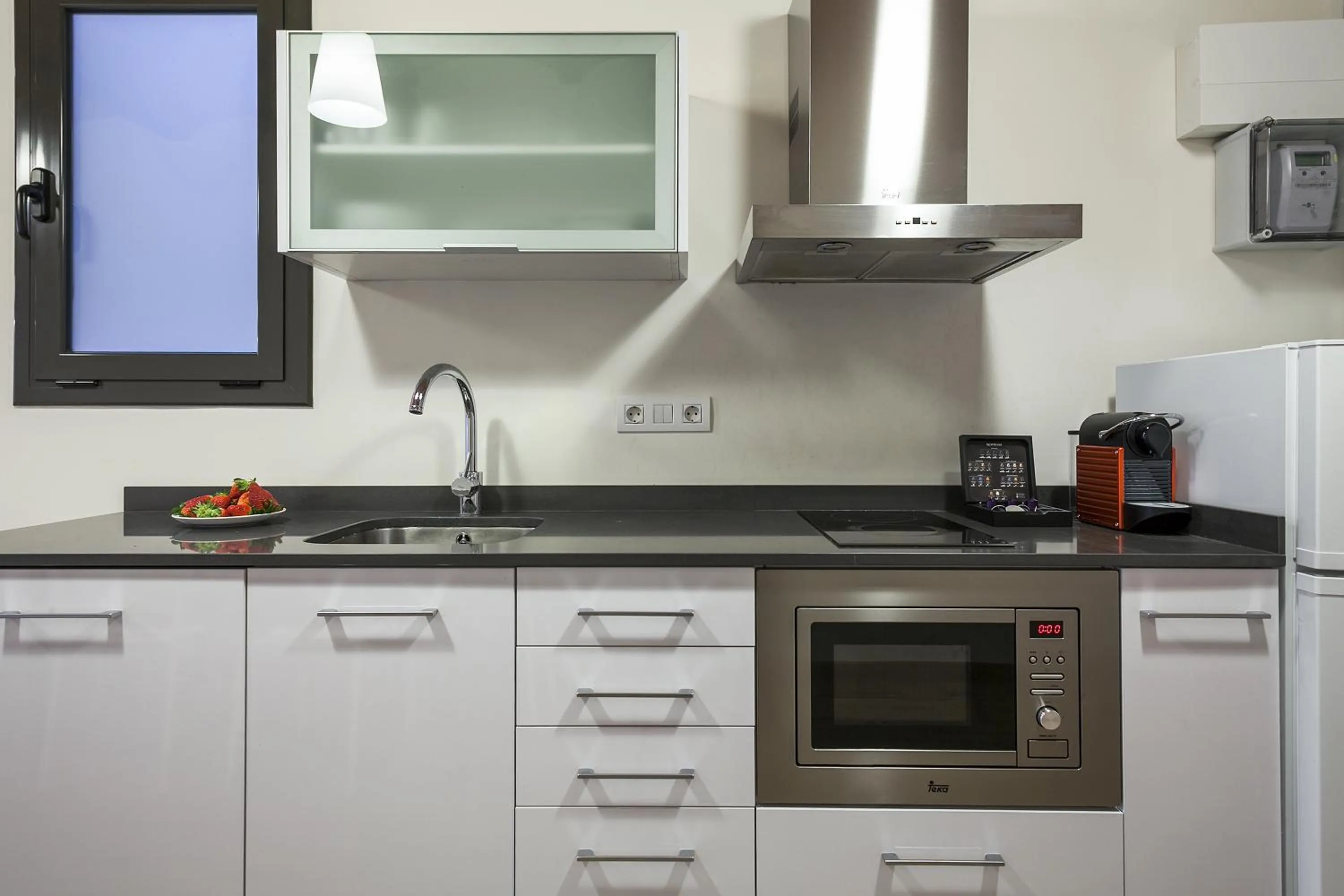 Kitchen or kitchenette in Fira Apartments by gaiarooms