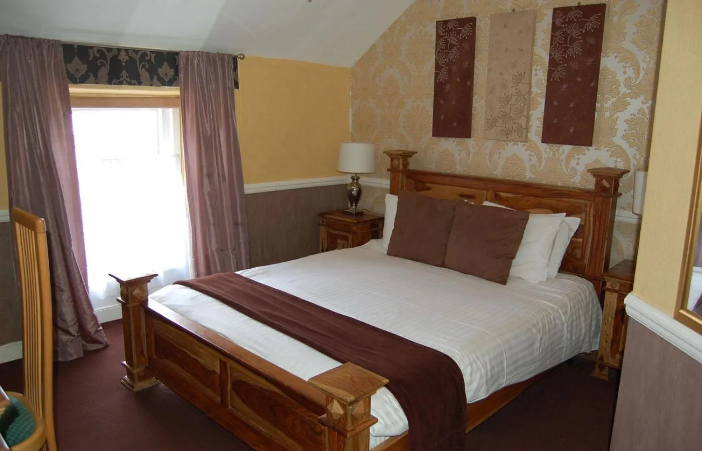 Bed in Schooner Hotel