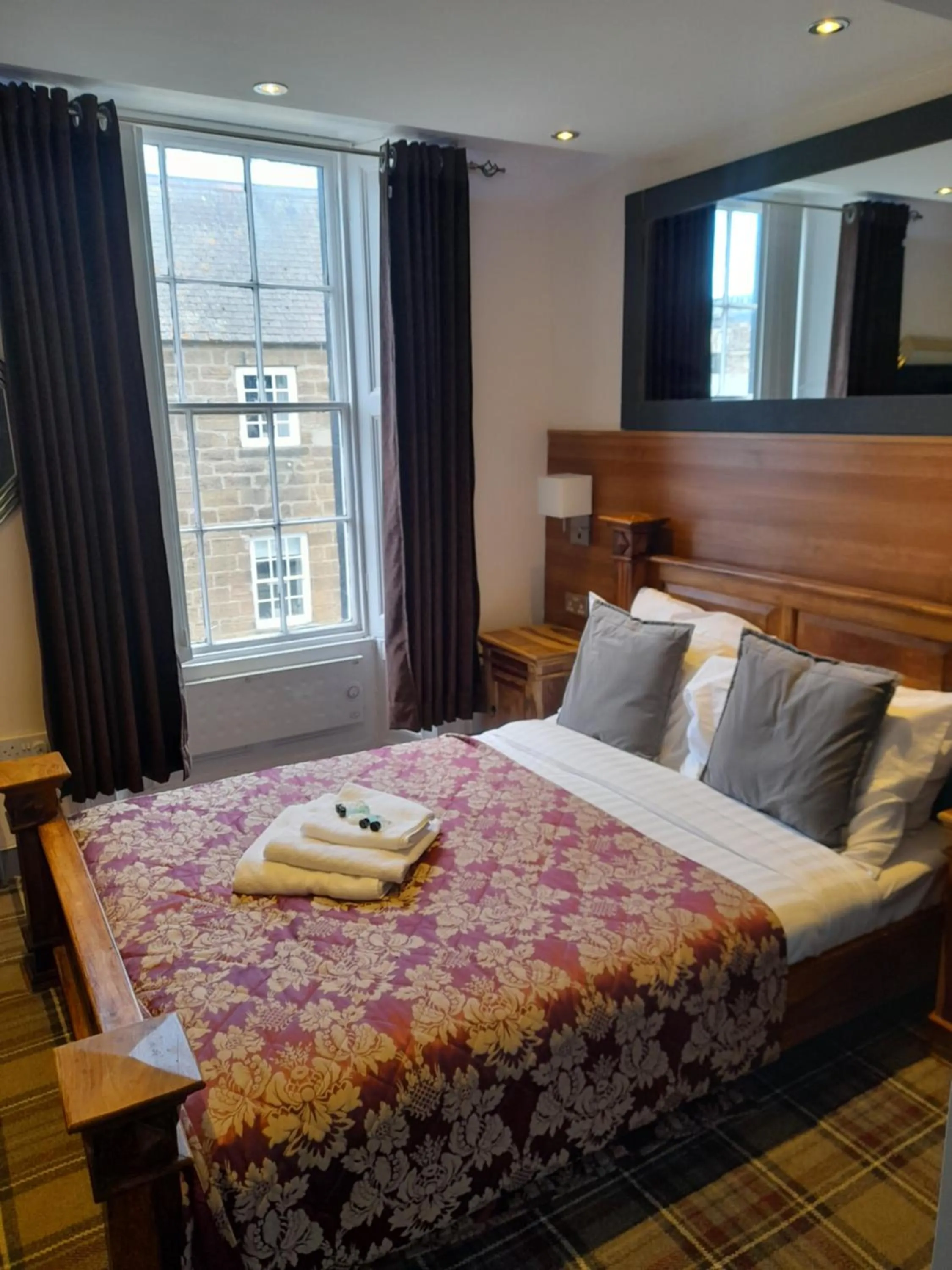 Bed in Schooner Hotel