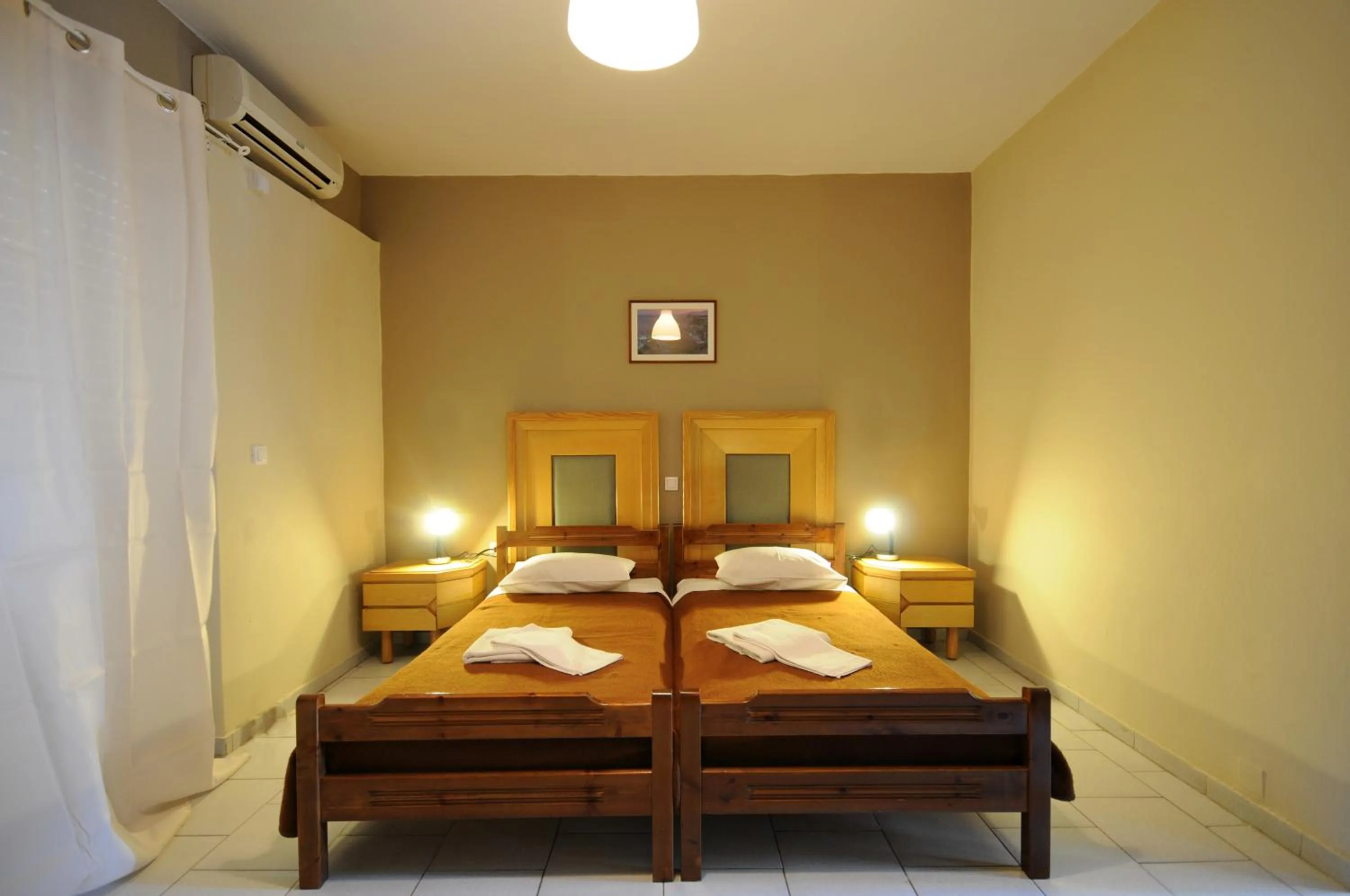 Bedroom, Bed in Manias Apartments