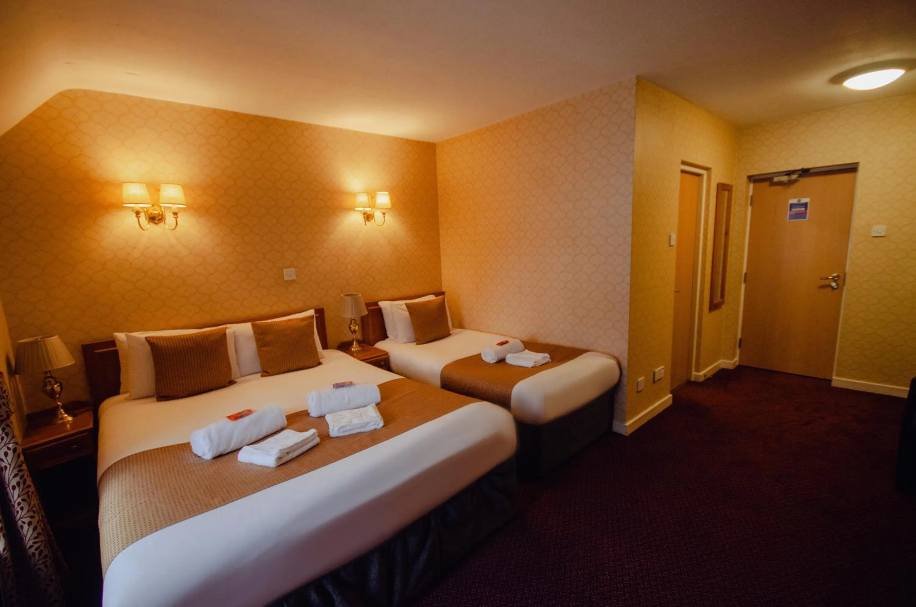 Bed in Howfield Manor Hotel