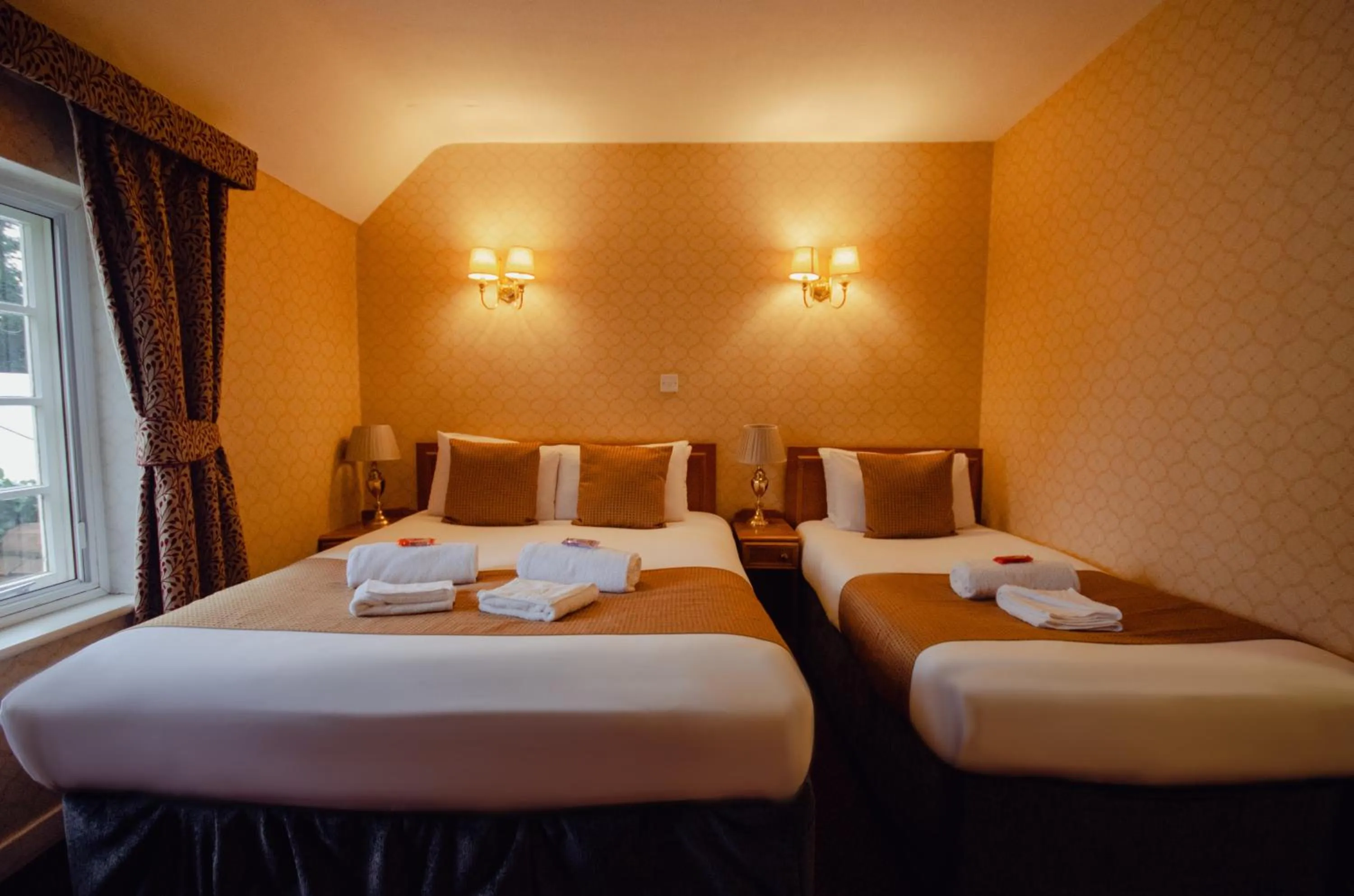 Bed in Howfield Manor Hotel