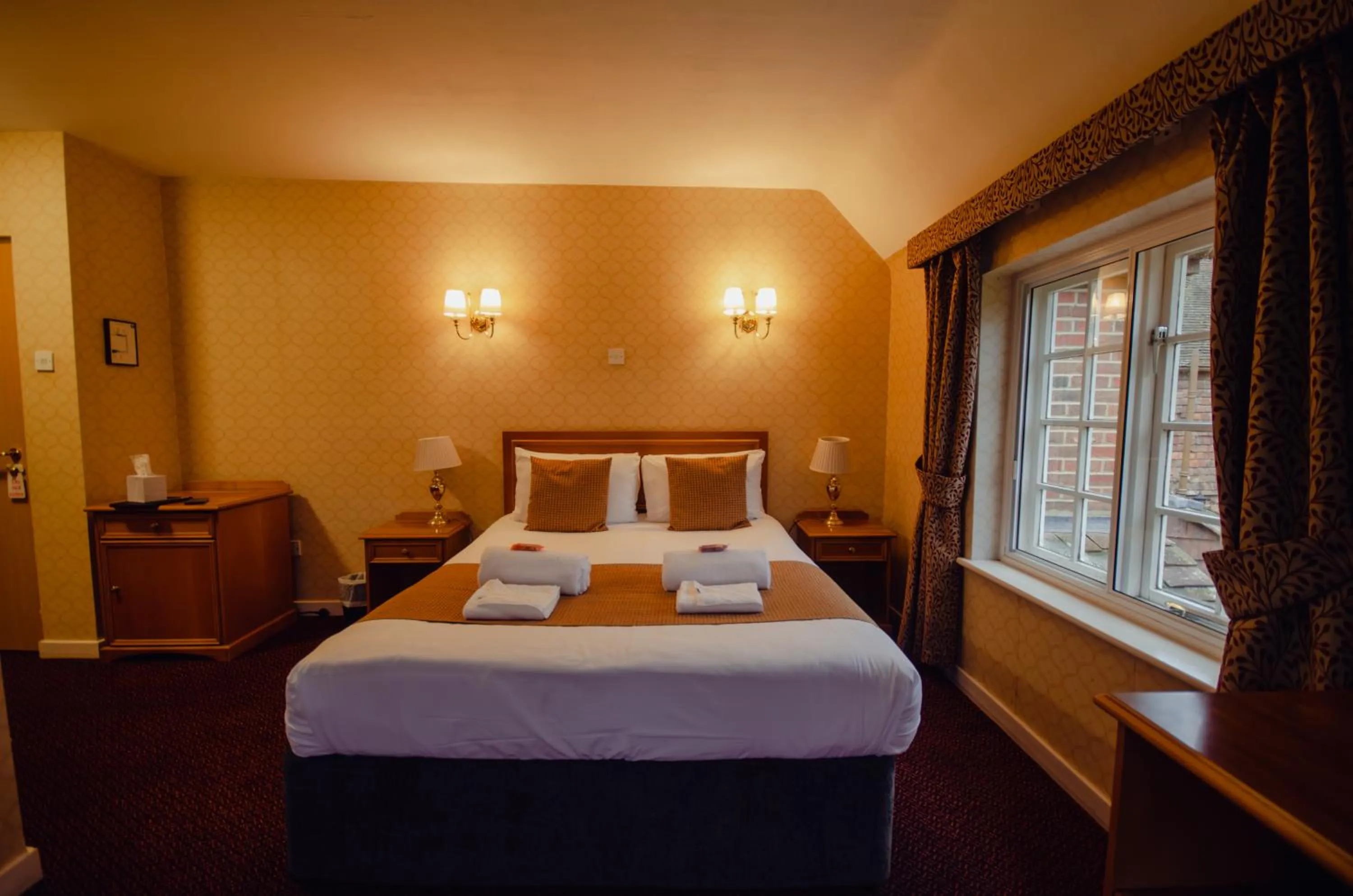 Bed in Howfield Manor Hotel