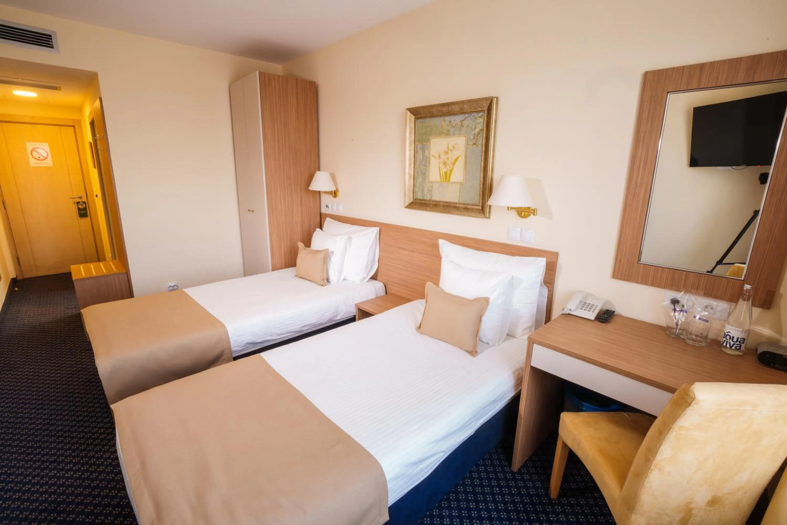 Bed in Hotel Monogram Park