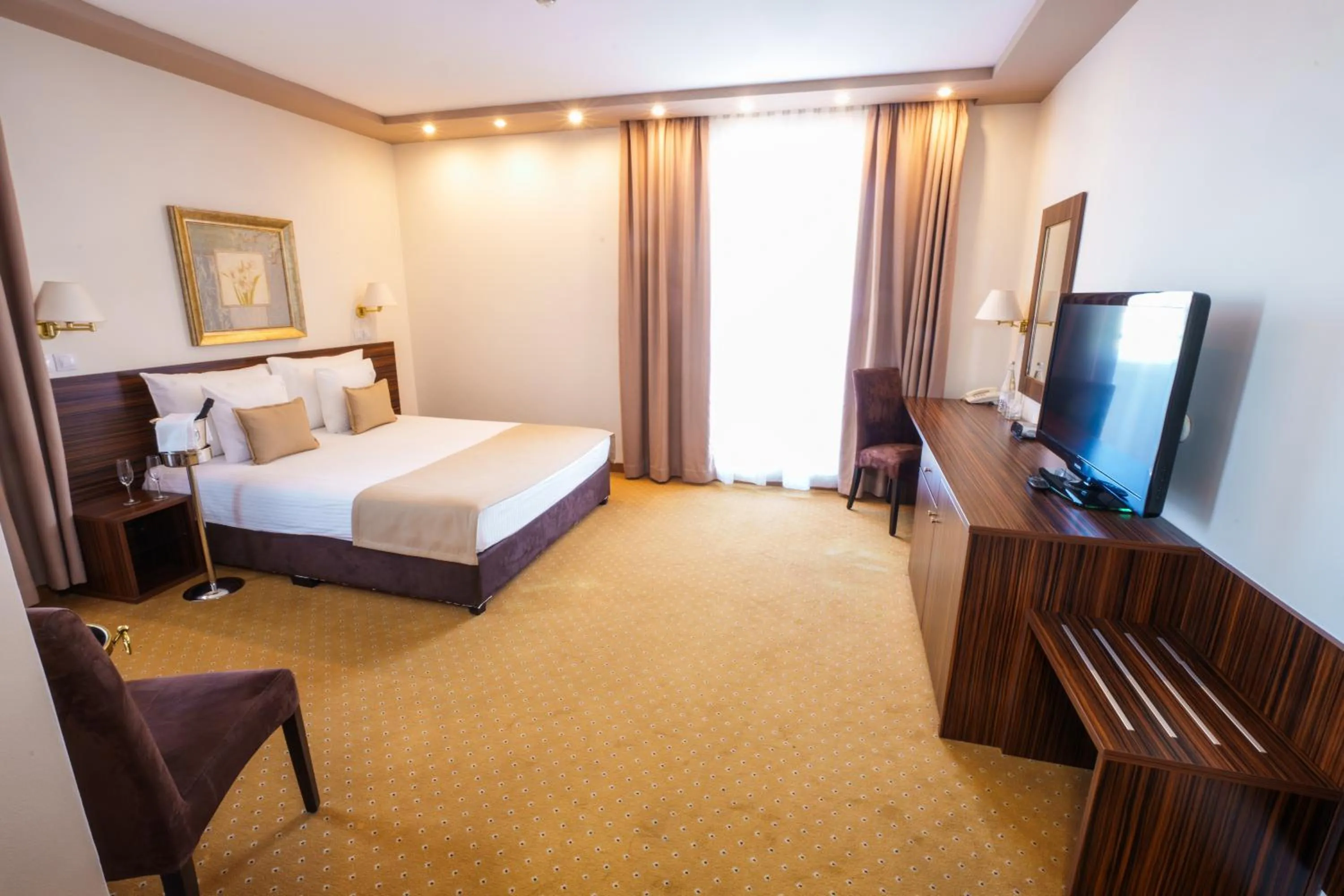 Bed in Hotel Monogram Park