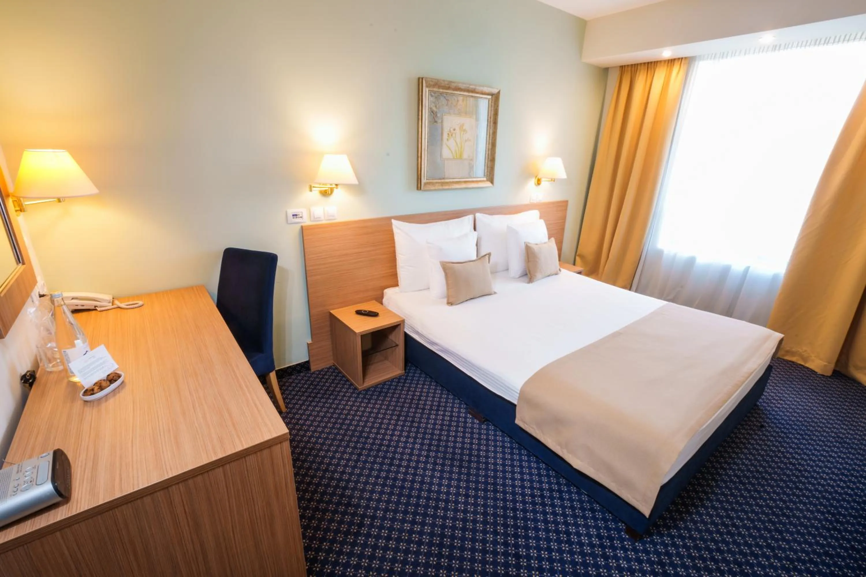 Bed in Hotel Monogram Park