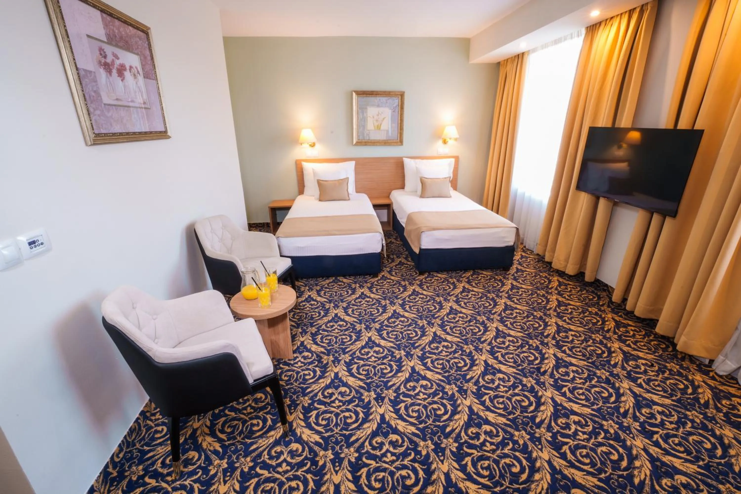 Bed in Hotel Monogram Park