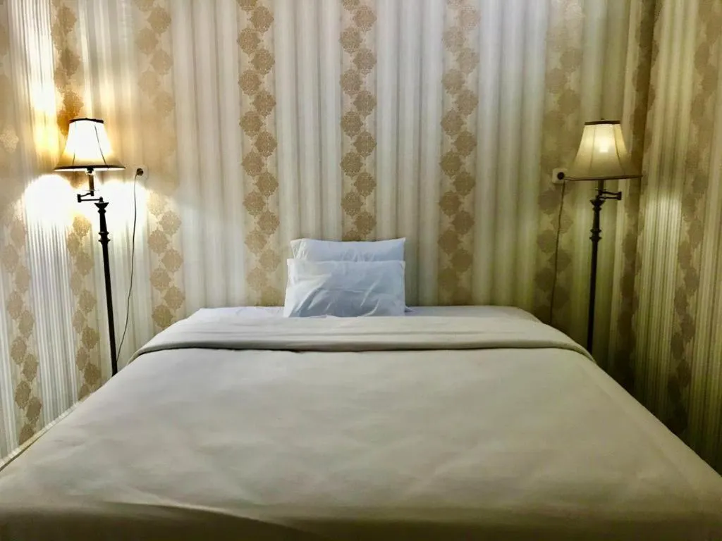 Bed in Penginapan Intan Bandara