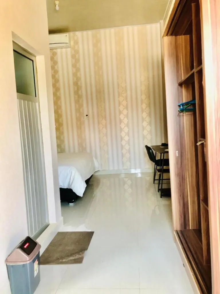 Bed in Penginapan Intan Bandara