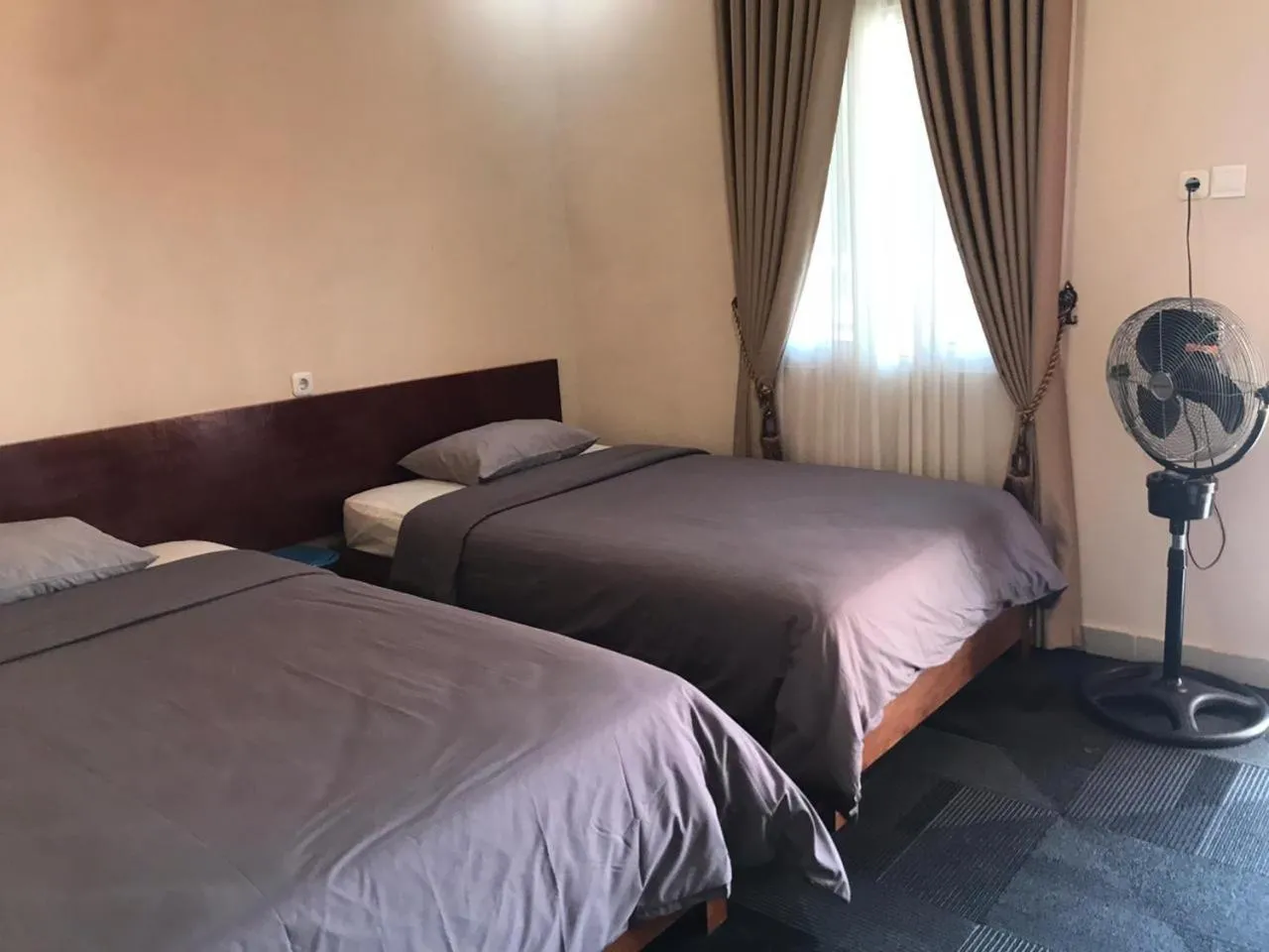 Bed in Penginapan Intan Bandara