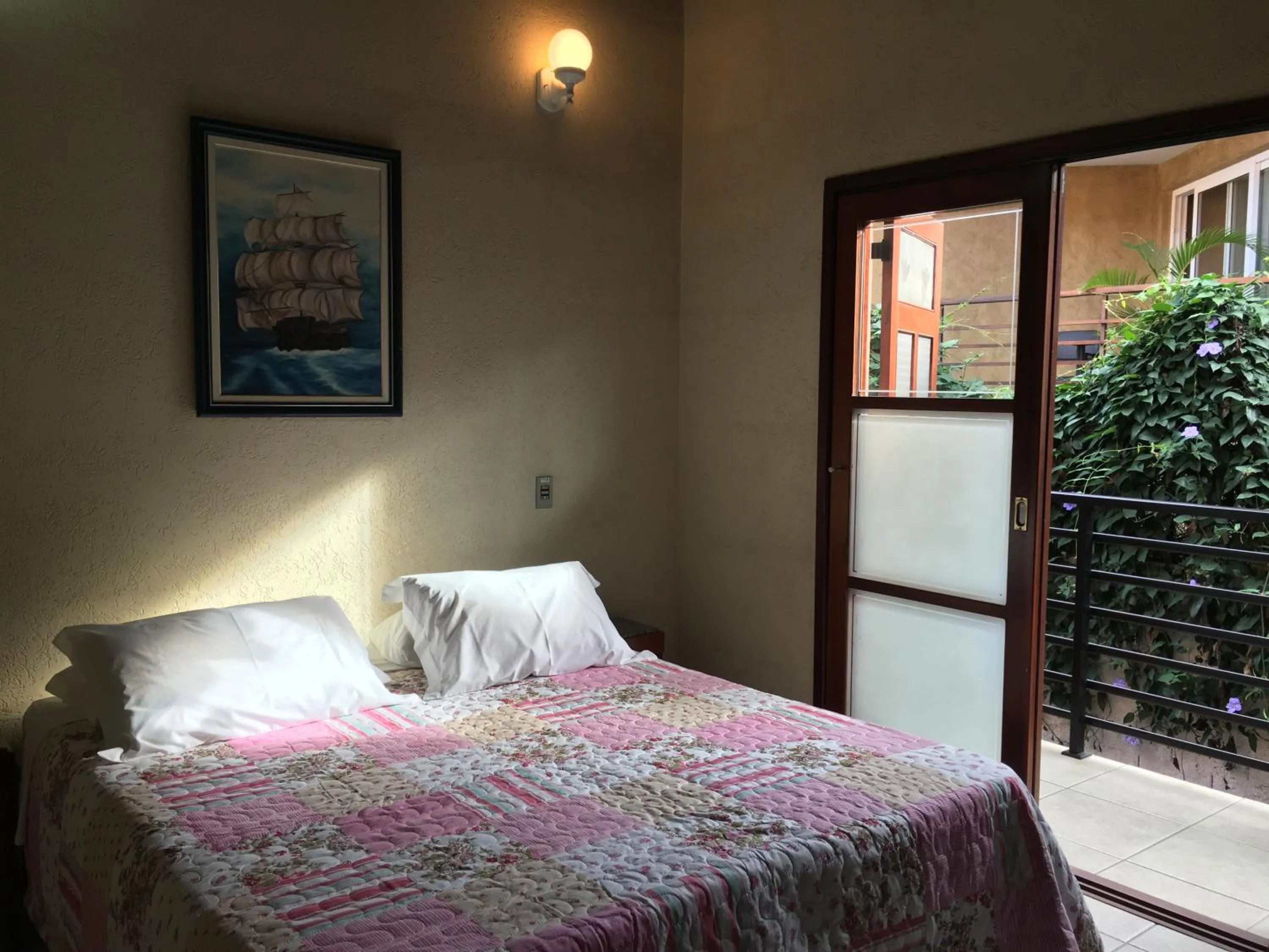 Bed in Pousada Irmãos do Mar