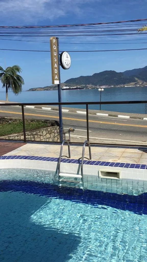 Swimming pool in Pousada Irmãos do Mar