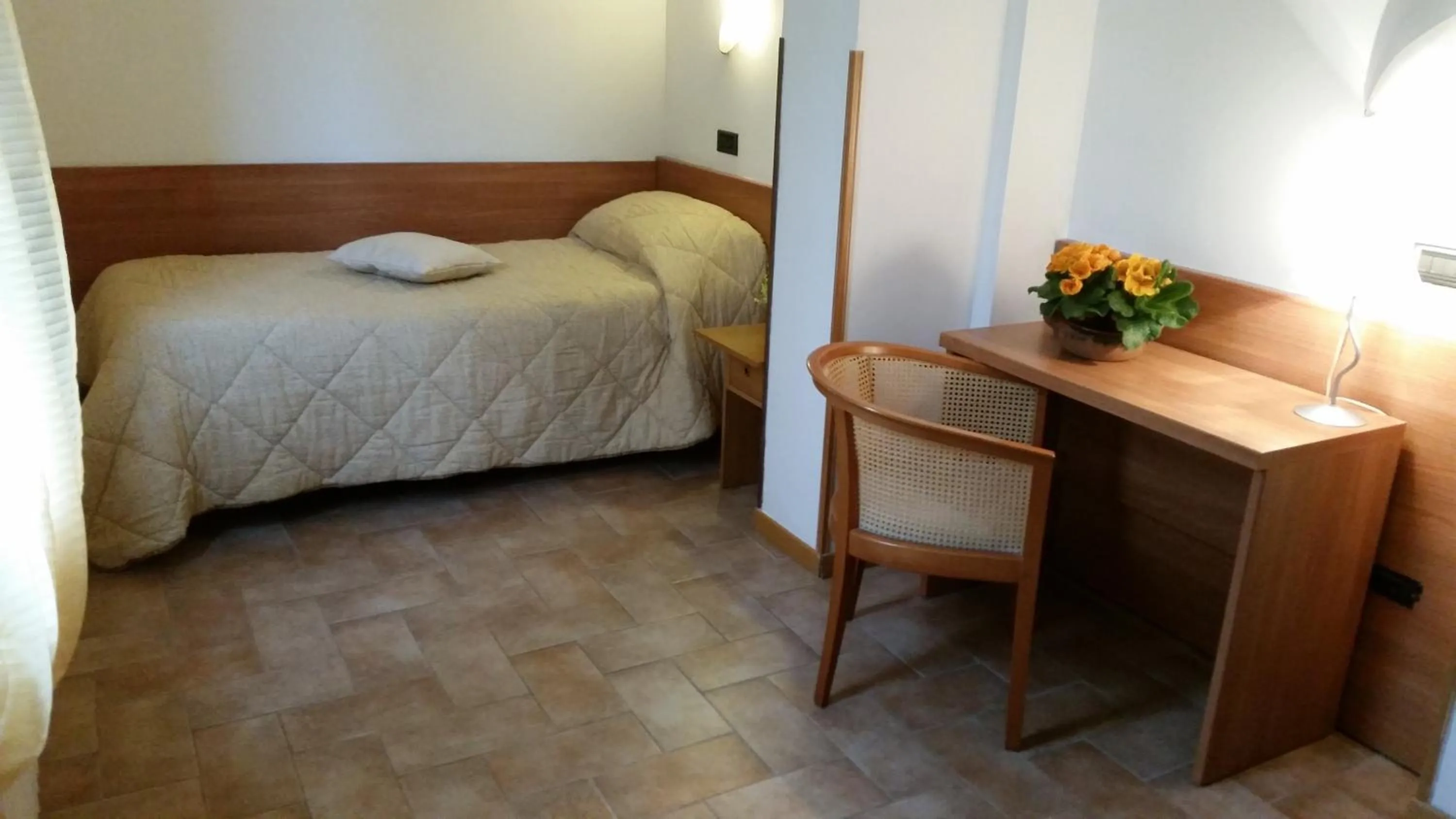 Bed in Albergo Vecchio Forno