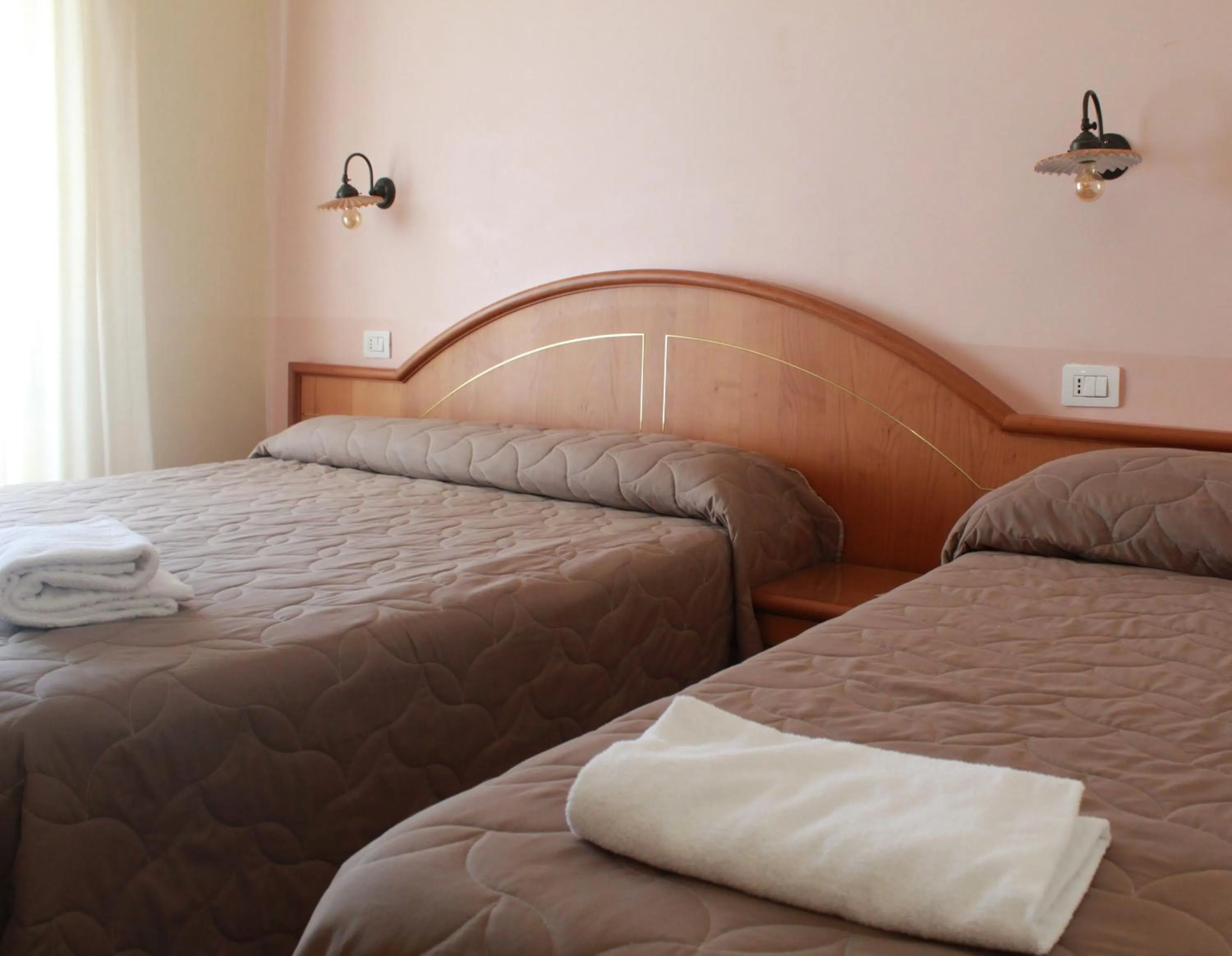 Bed in Hotel Ristorante Benigni