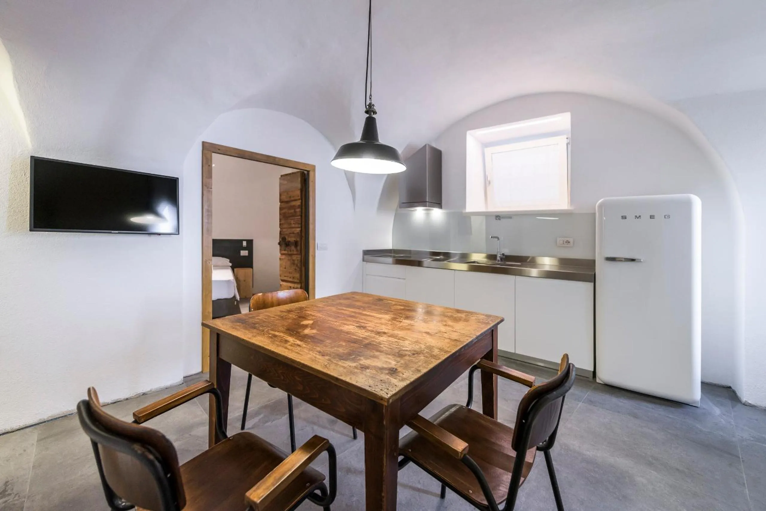 TV and multimedia in Casa Kaki - Eco friendly Apartments with Parking & Private Courtyard